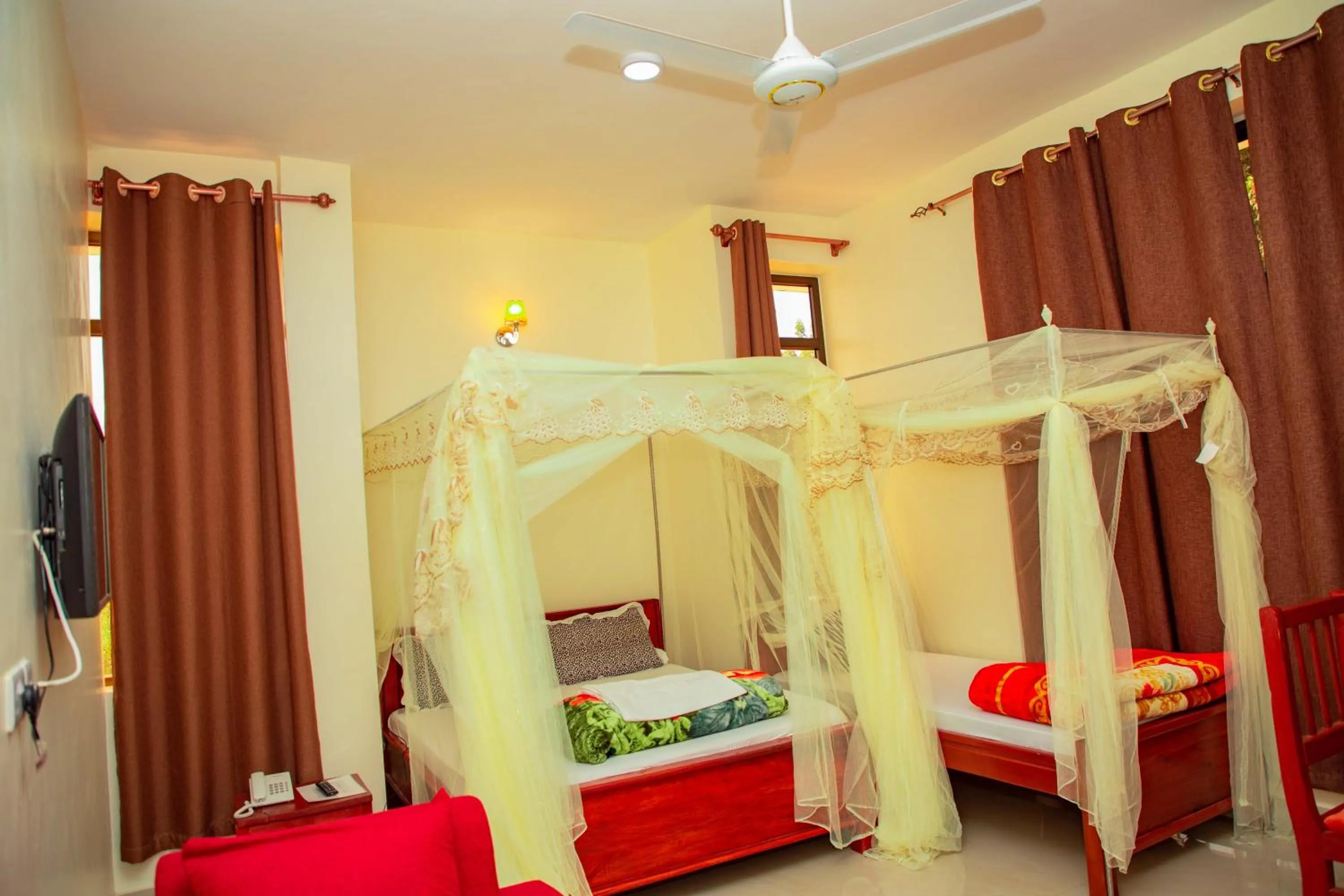 Bed in Kilimanjaro White House Hotel