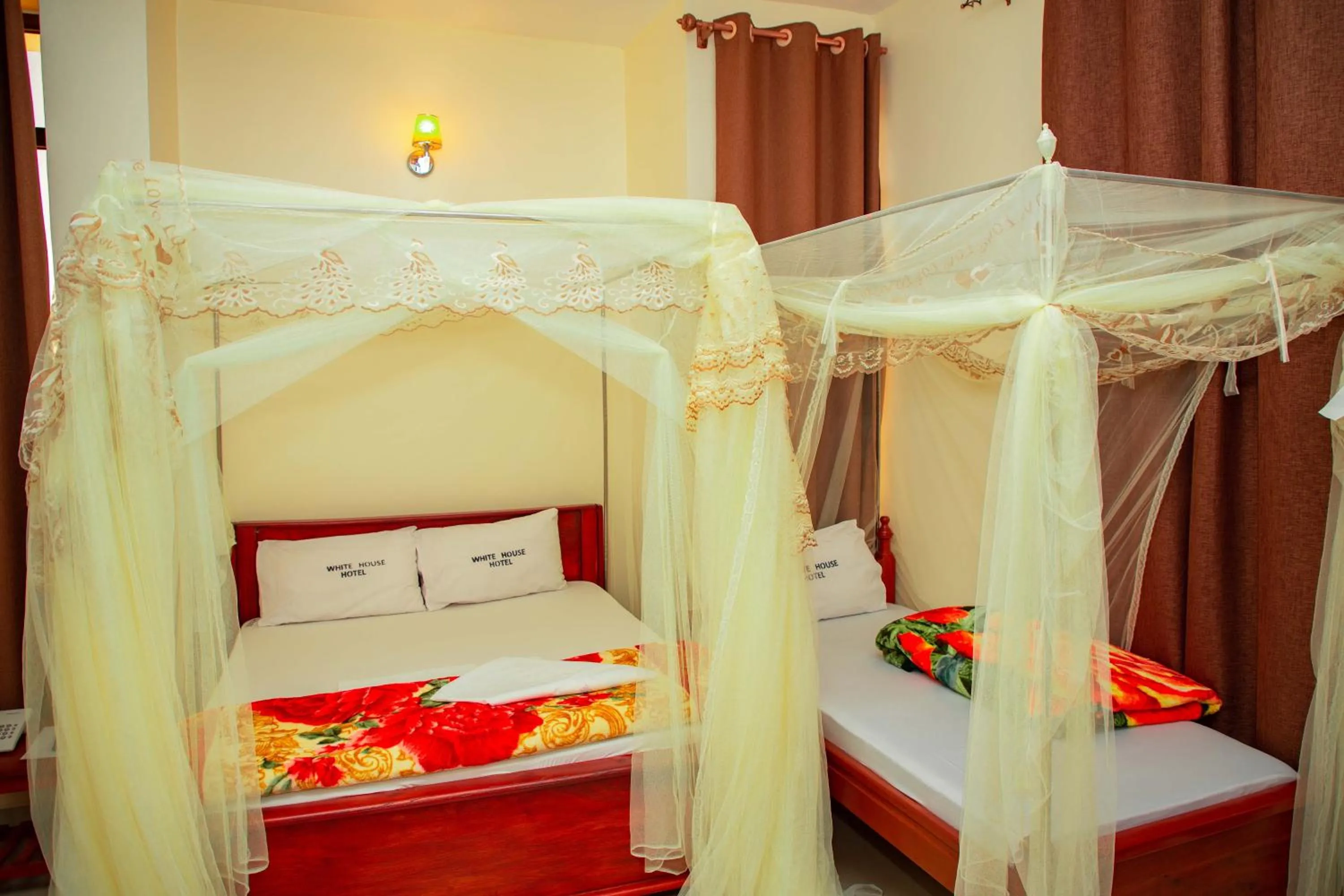 Bed in Kilimanjaro White House Hotel