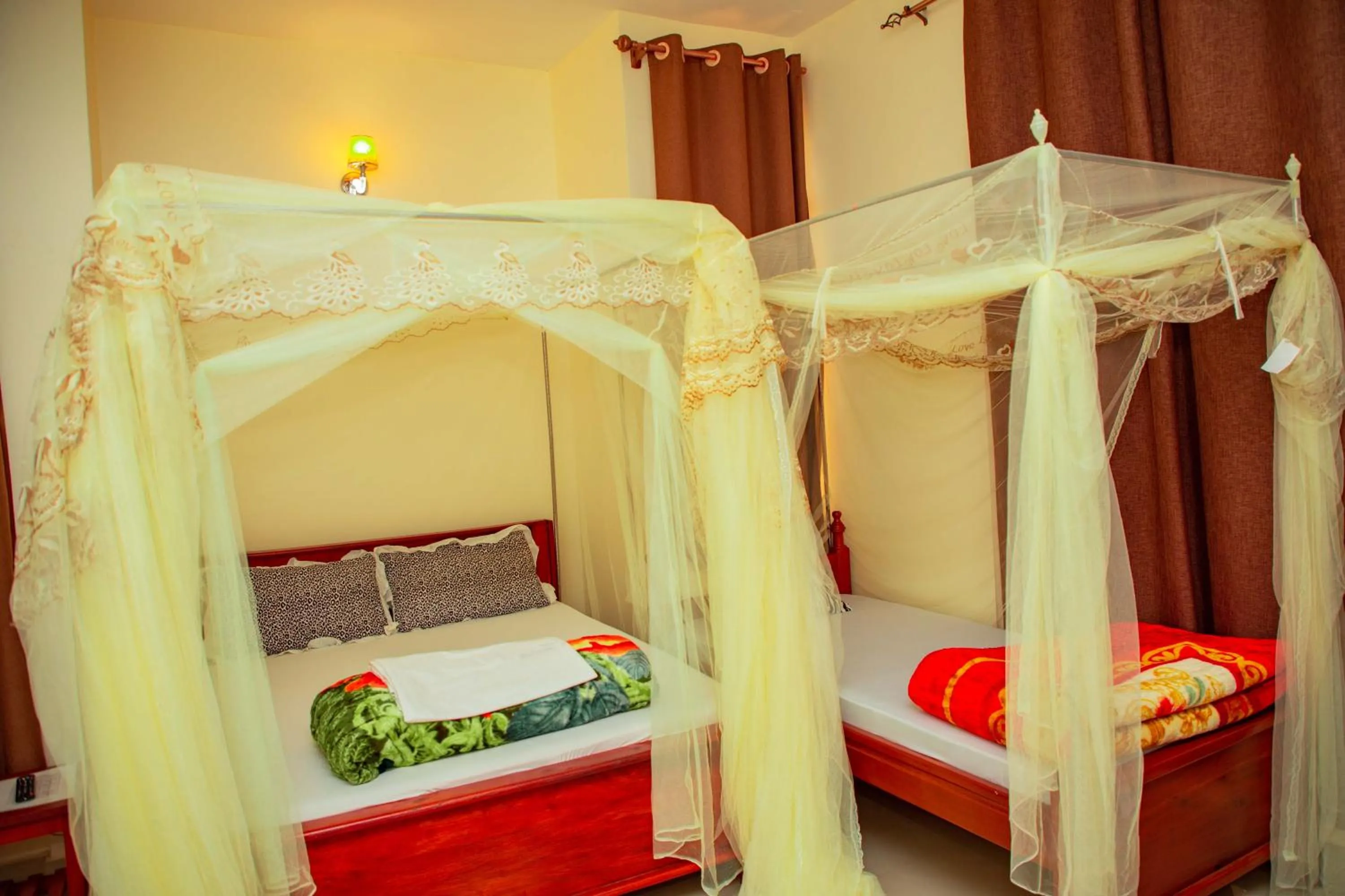 Bed in Kilimanjaro White House Hotel