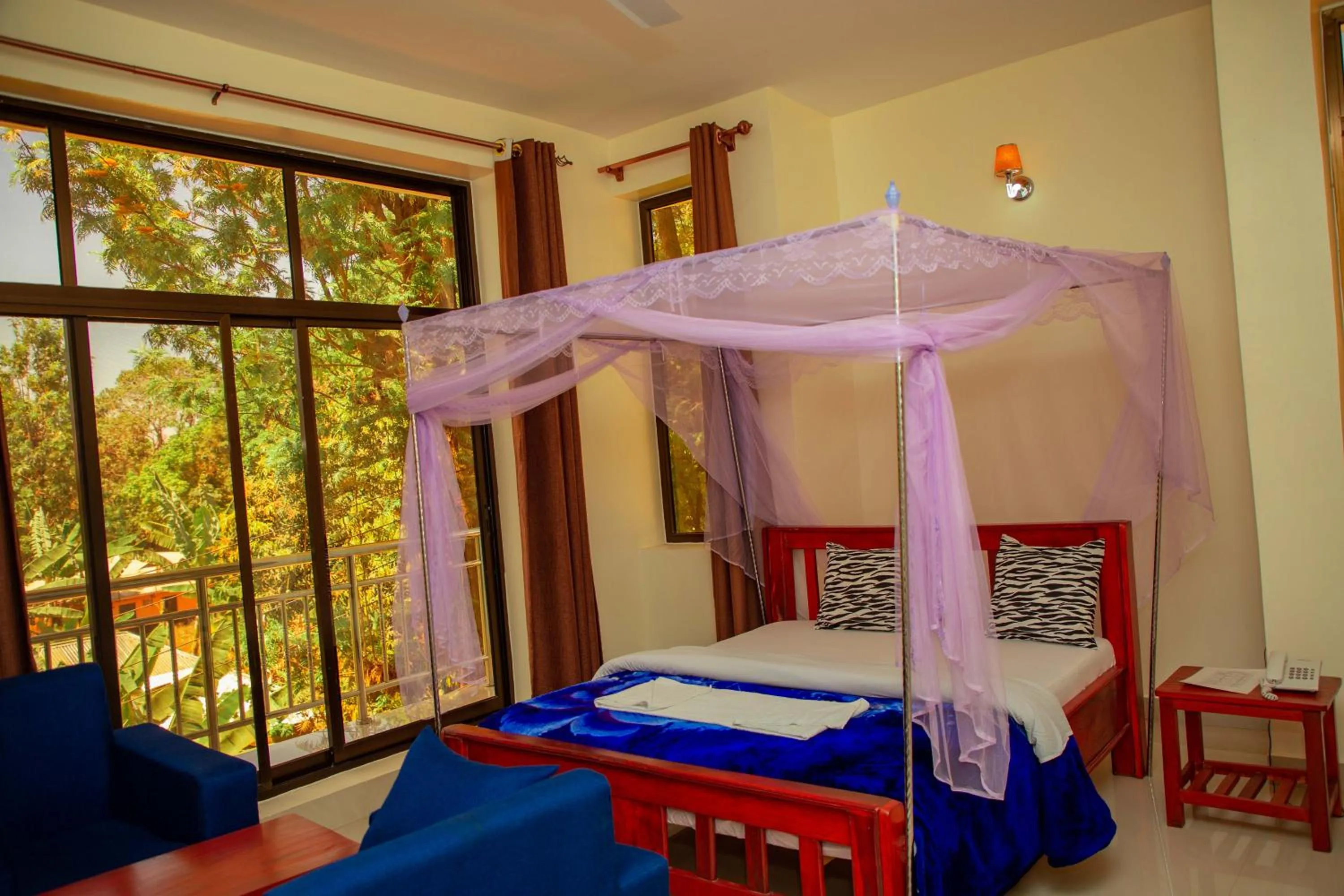 Bed in Kilimanjaro White House Hotel