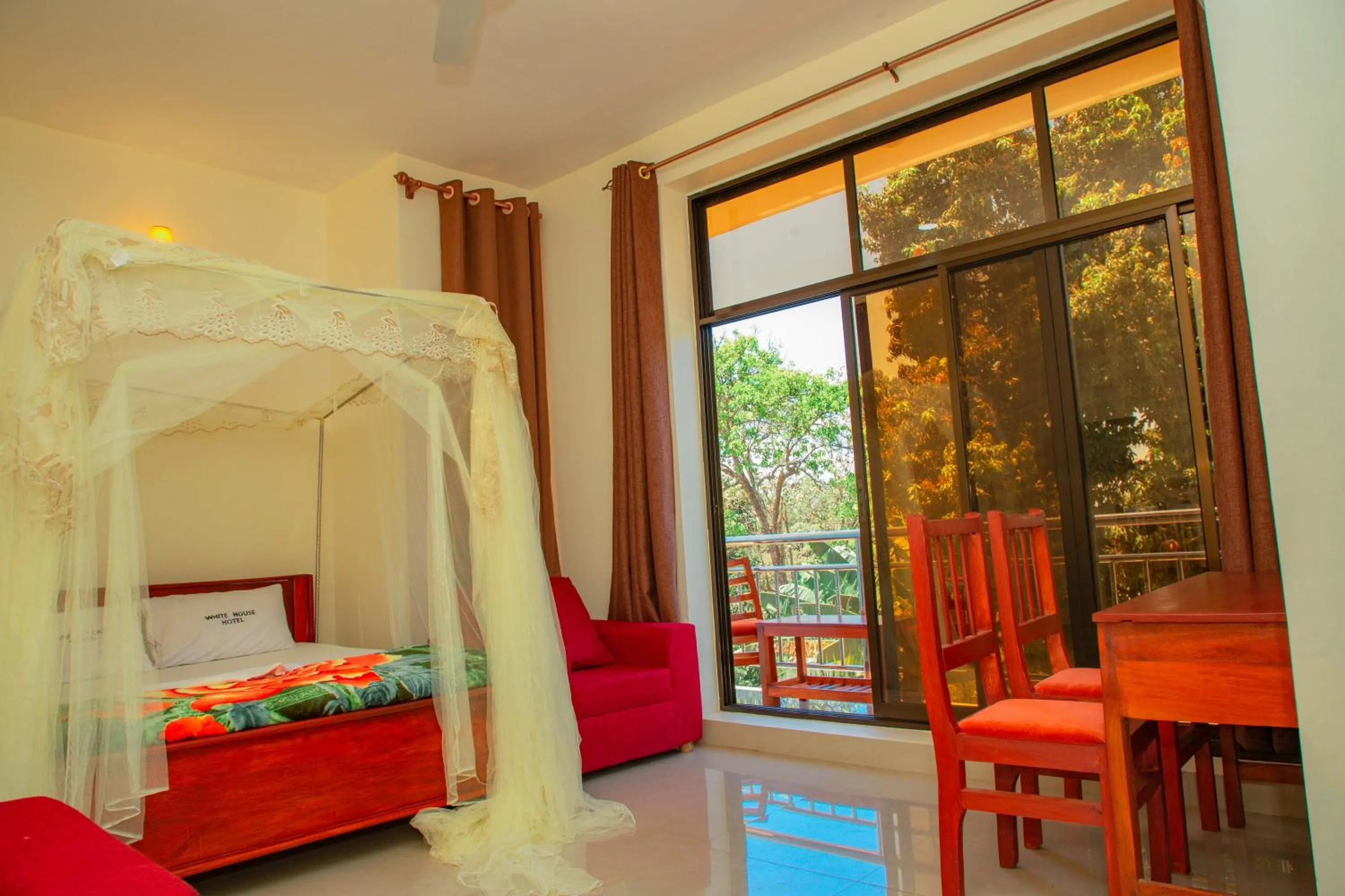 Bed in Kilimanjaro White House Hotel