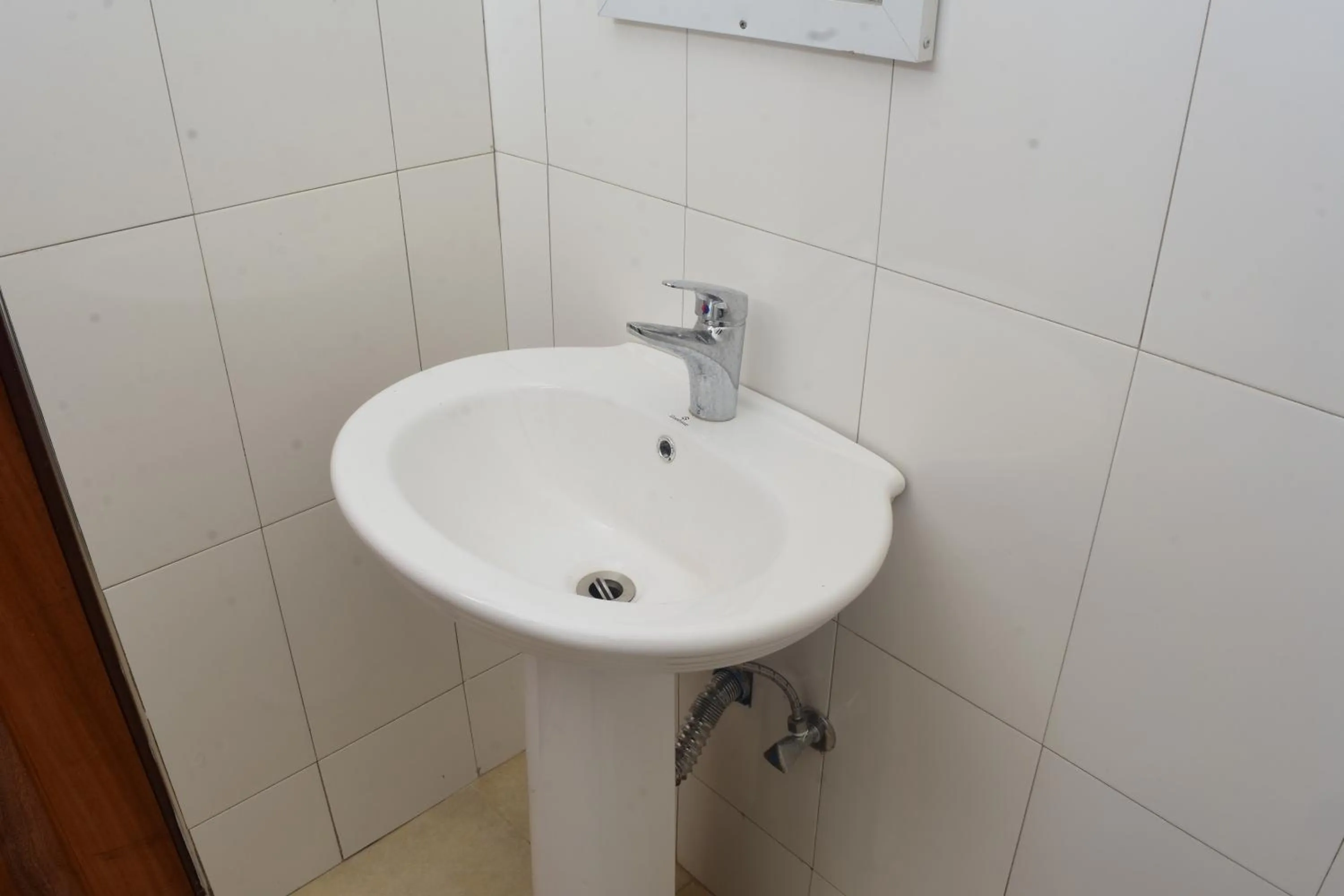 Toilet in Kilimanjaro White House Hotel