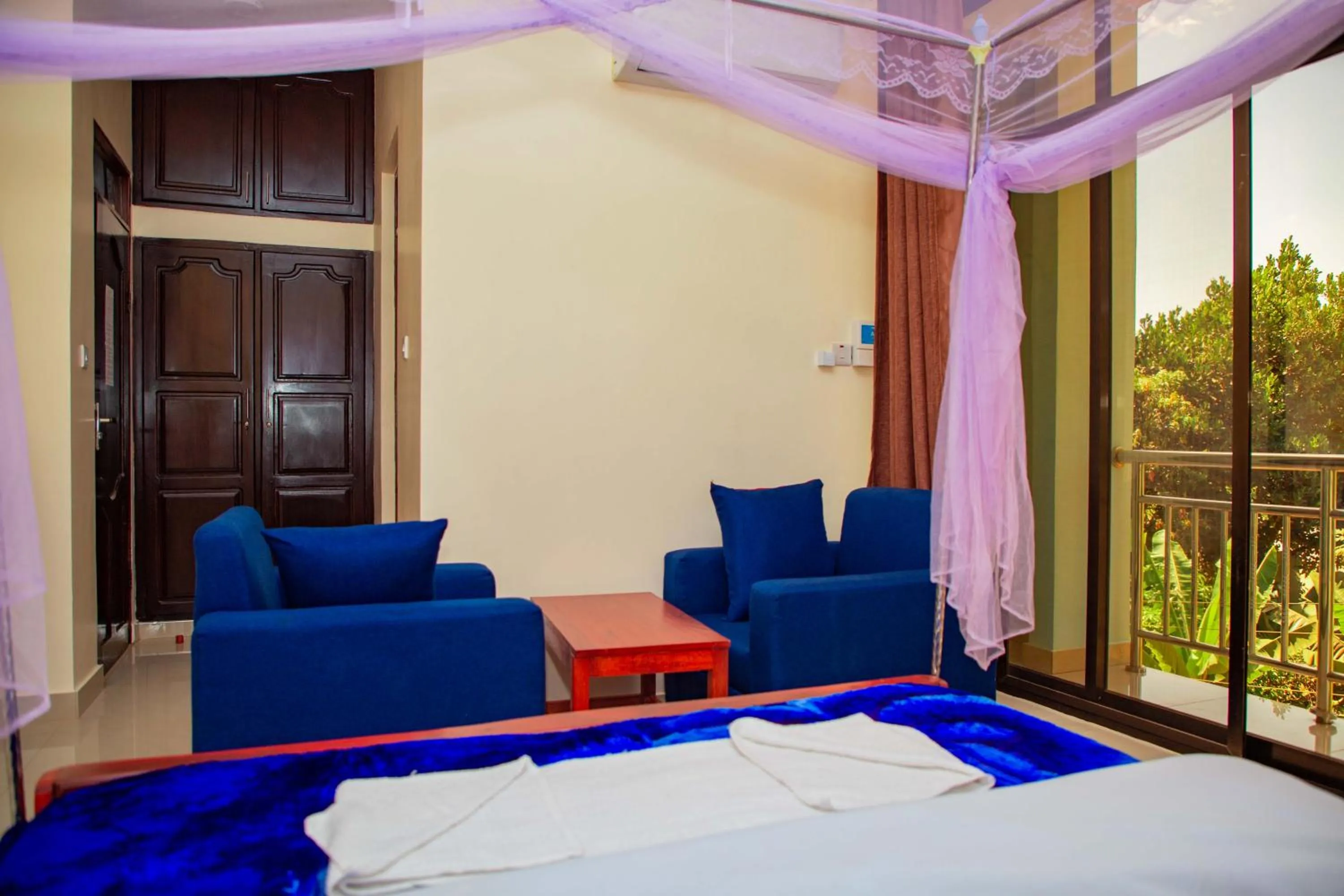 Bed in Kilimanjaro White House Hotel