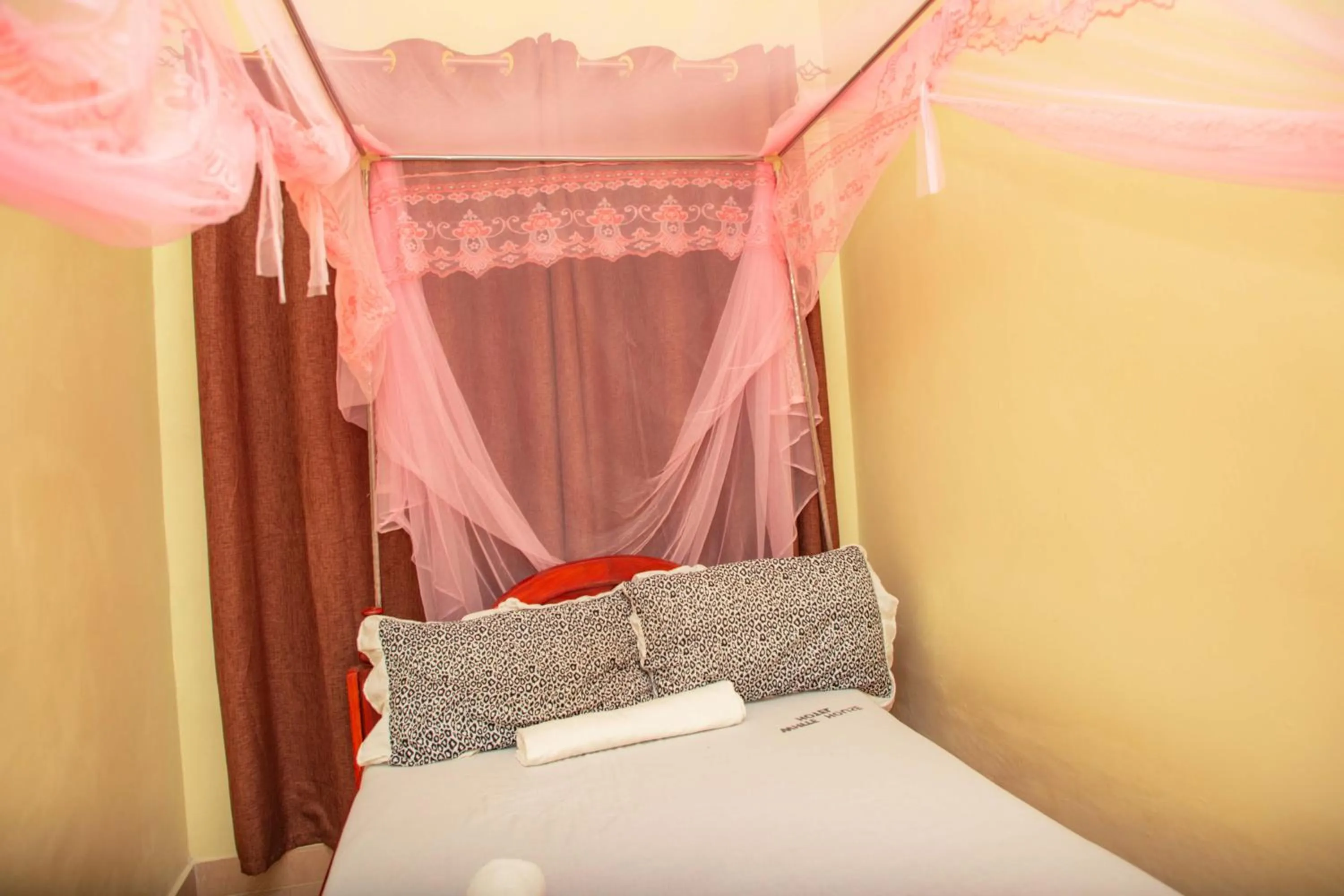 Bed in Kilimanjaro White House Hotel