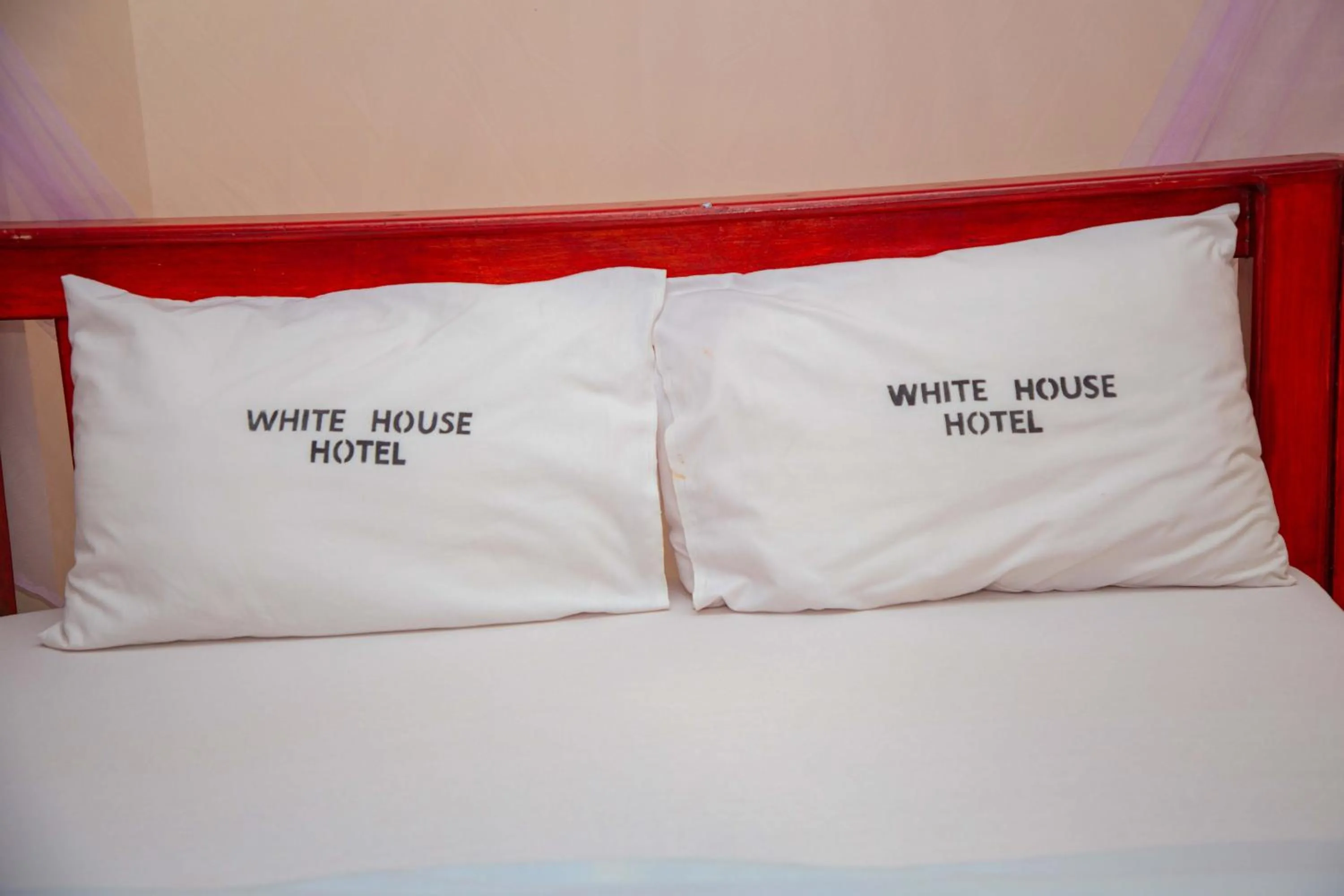 Bed in Kilimanjaro White House Hotel