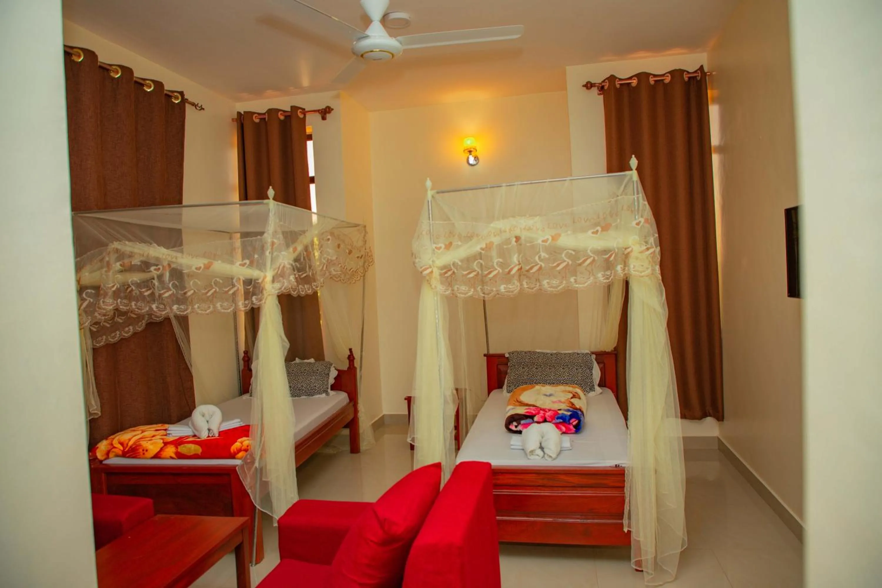 Bed in Kilimanjaro White House Hotel