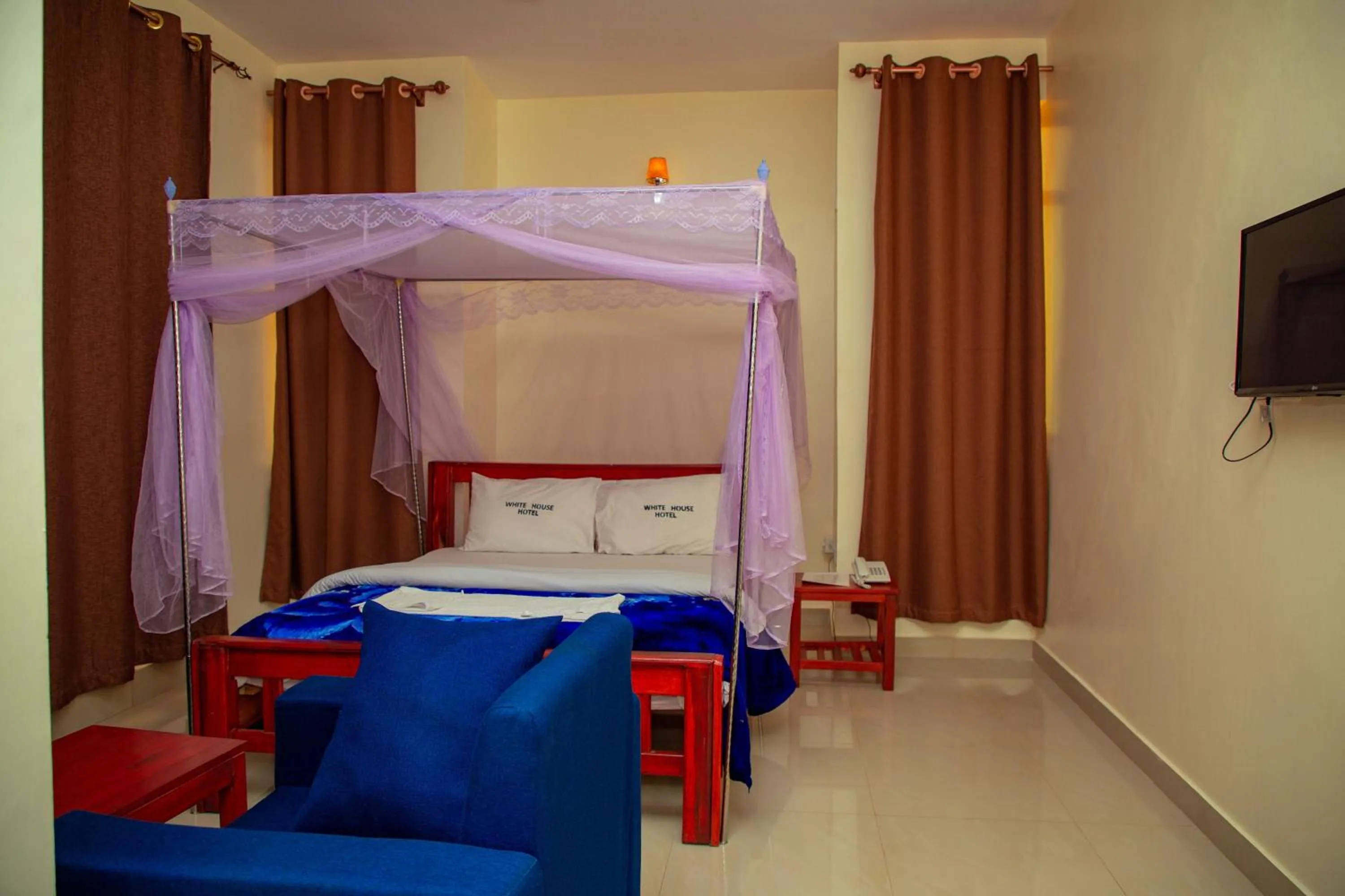 Bed in Kilimanjaro White House Hotel