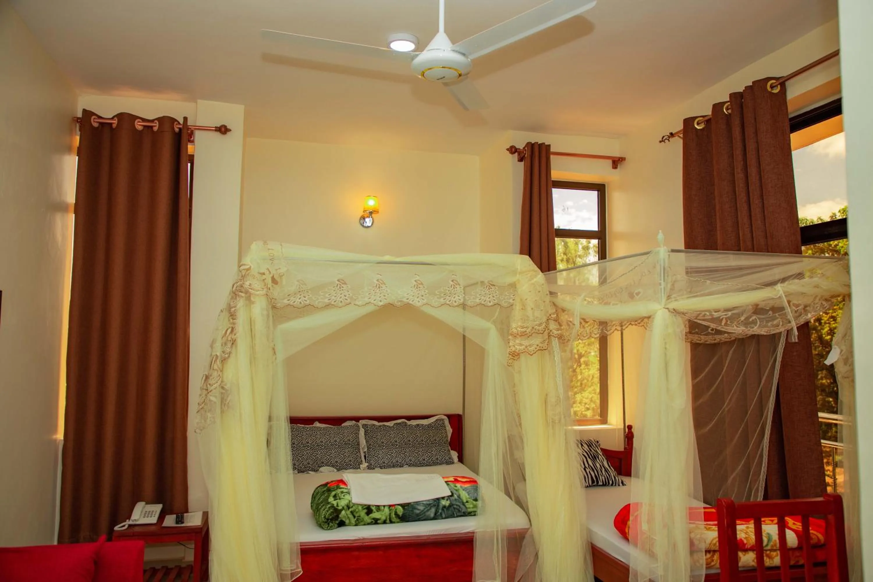 Bed in Kilimanjaro White House Hotel