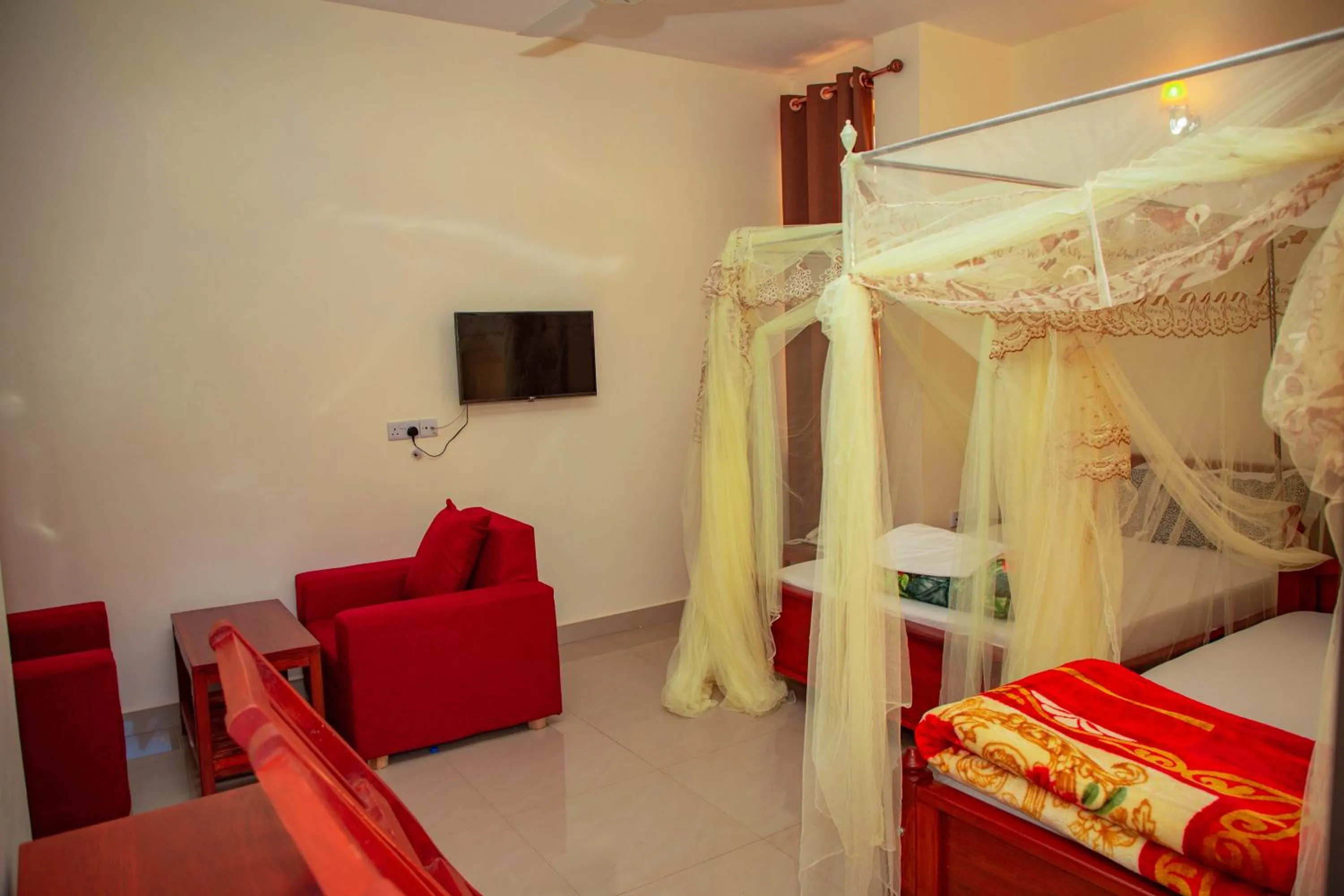 Bed in Kilimanjaro White House Hotel