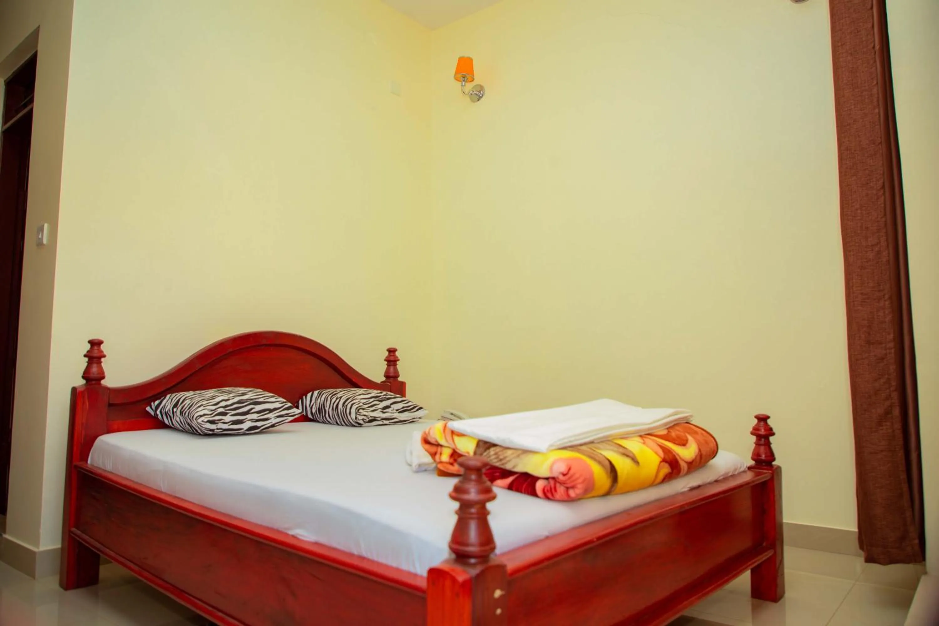 Bed in Kilimanjaro White House Hotel