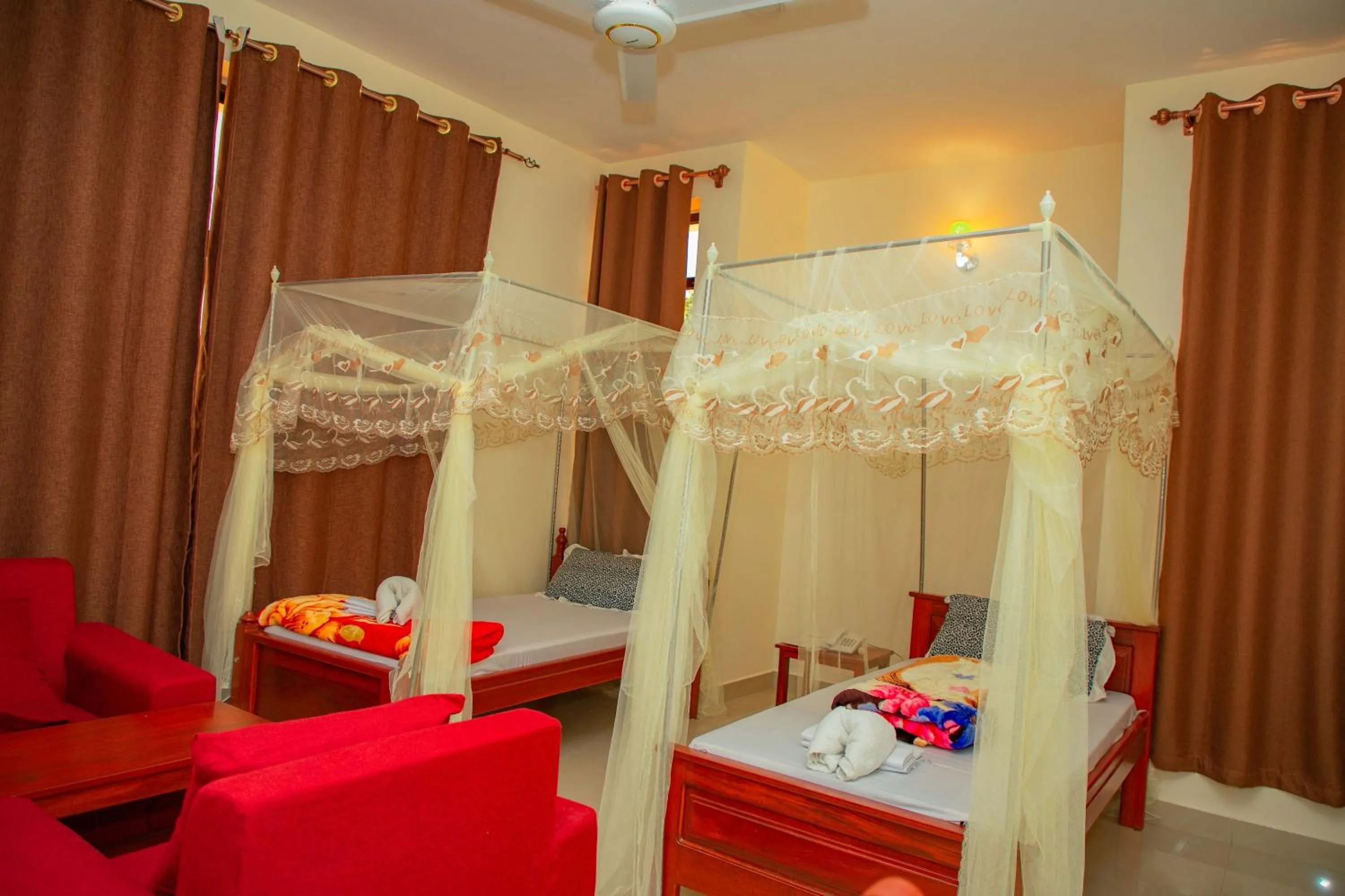 Bed in Kilimanjaro White House Hotel