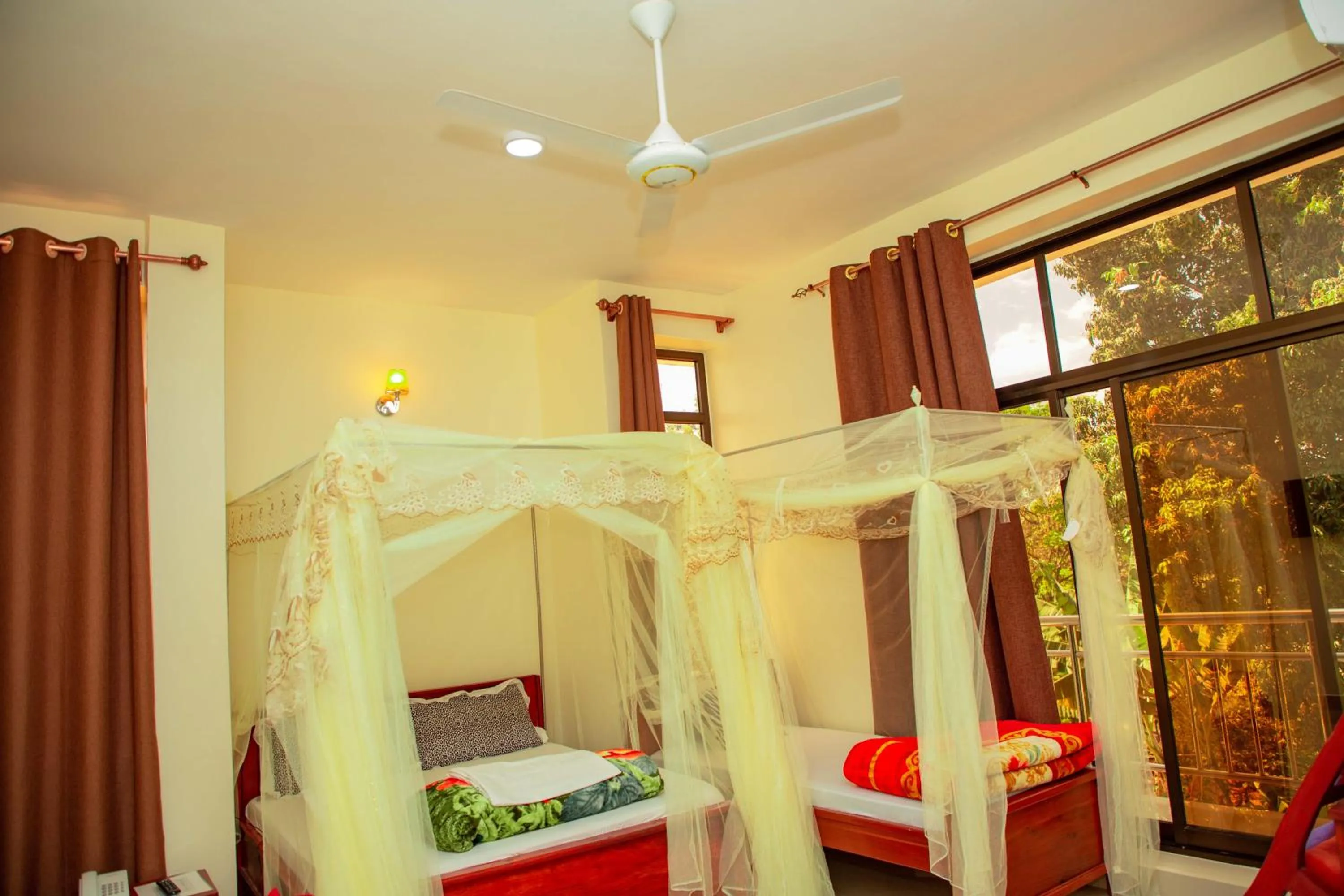 Bed in Kilimanjaro White House Hotel