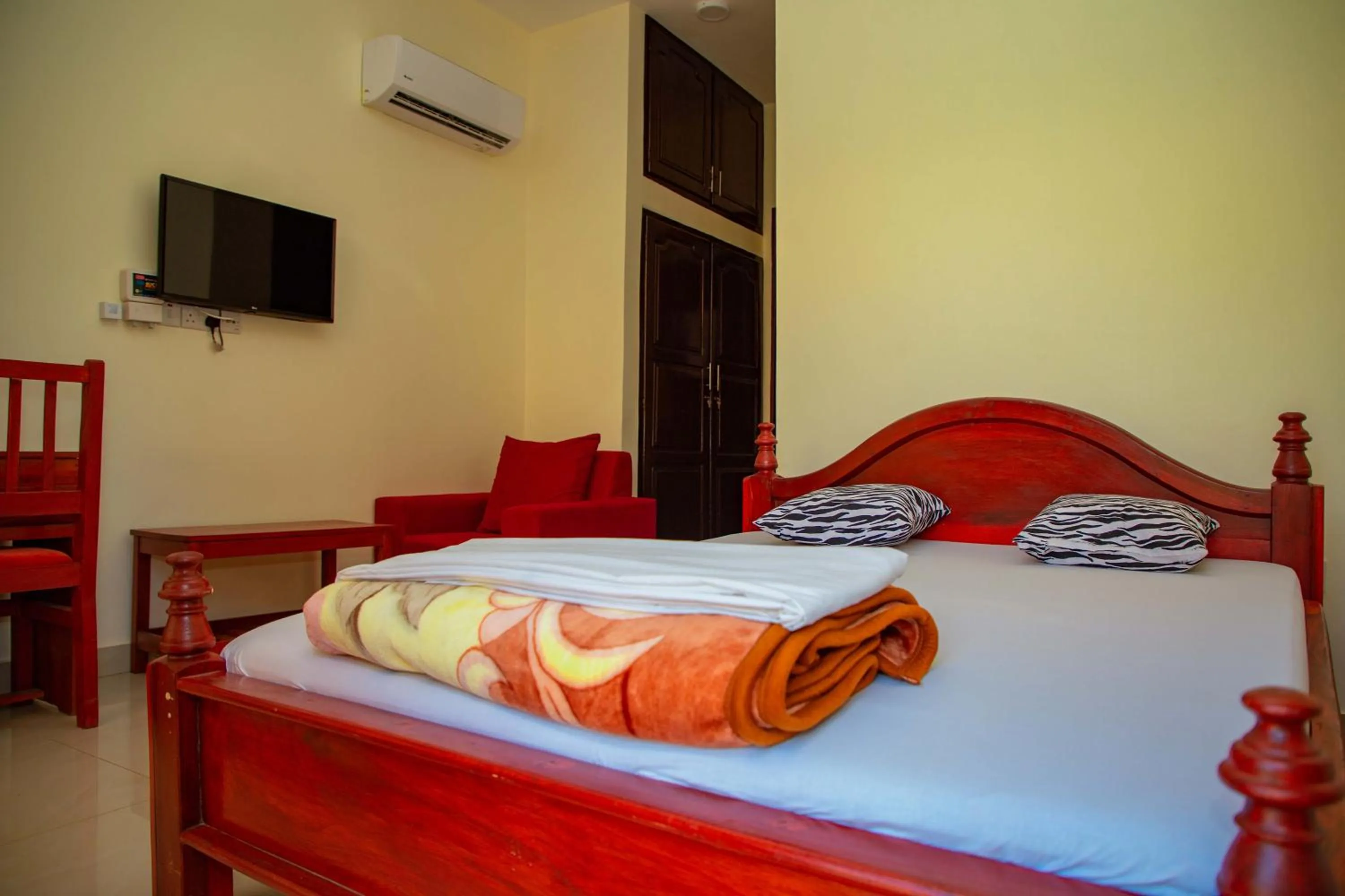 Bed in Kilimanjaro White House Hotel