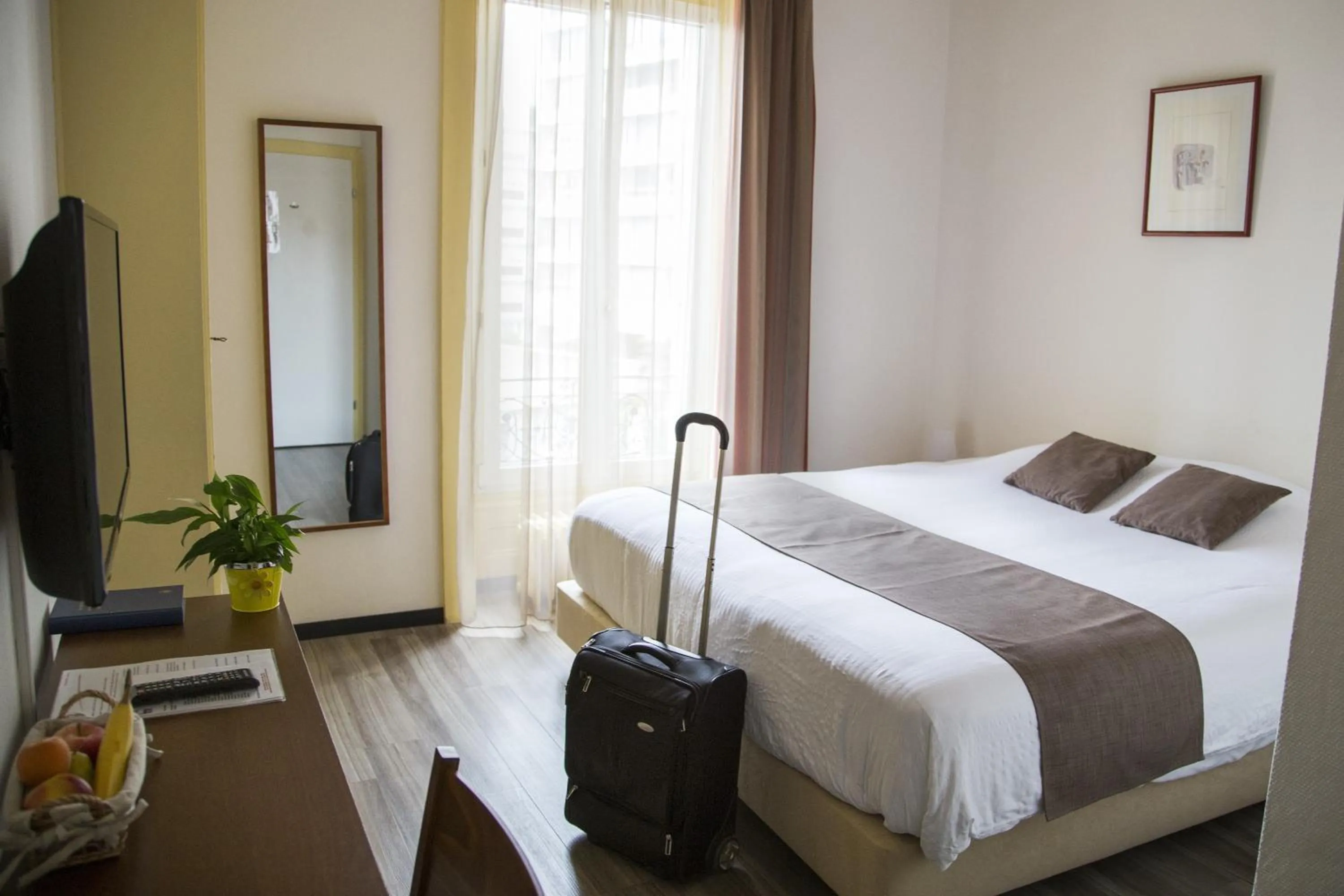 Bedroom in Hôtel du Marché