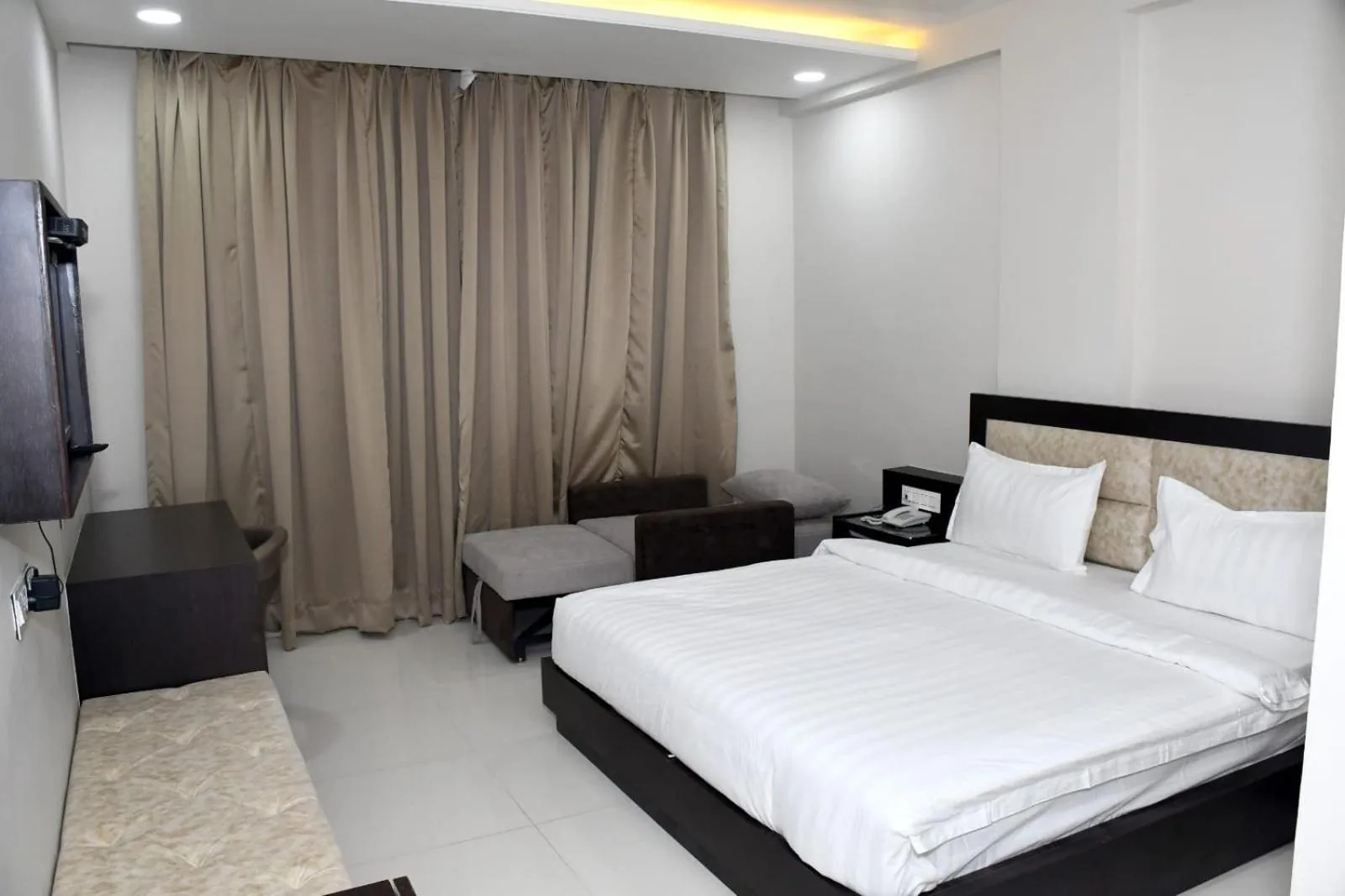 Bed in The Aanandam Hotel Resort