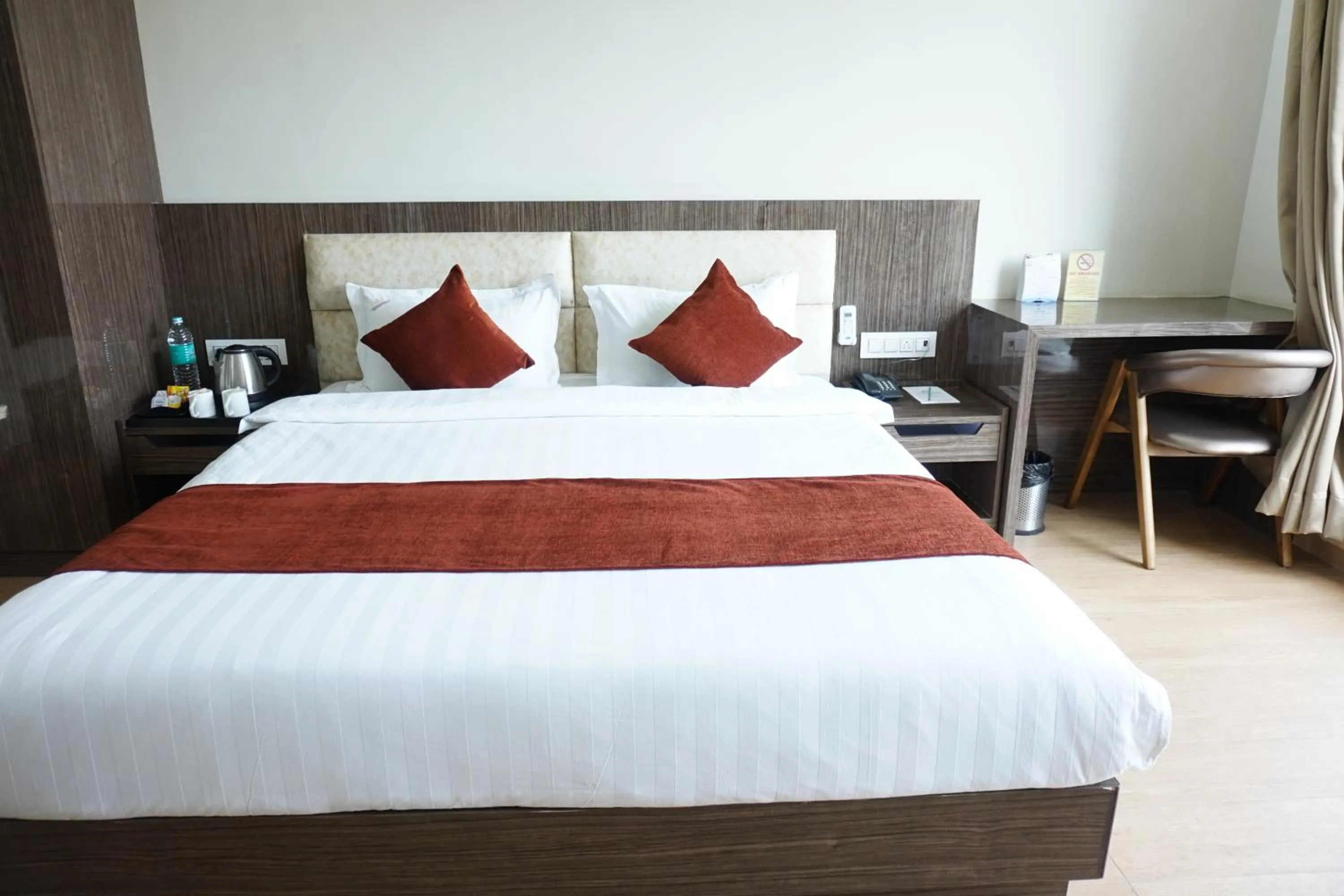 Bed in The Aanandam Hotel Resort