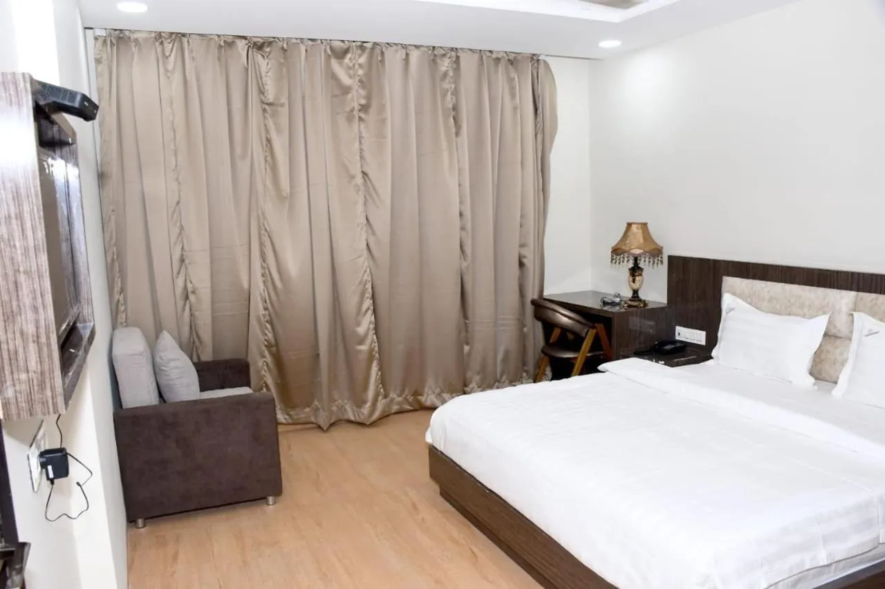 Bed in The Aanandam Hotel Resort