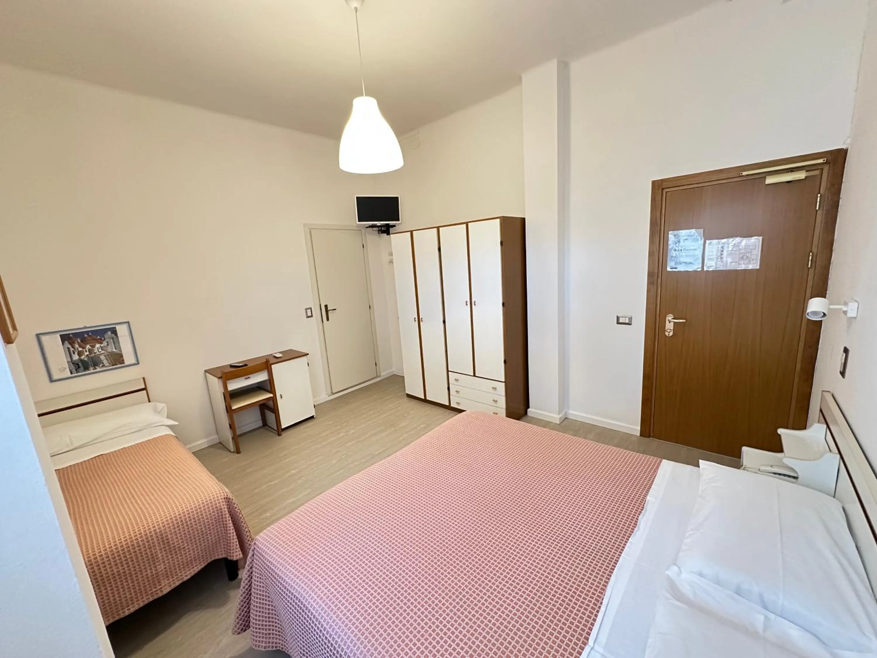 Bed in Hotel Fiorenza