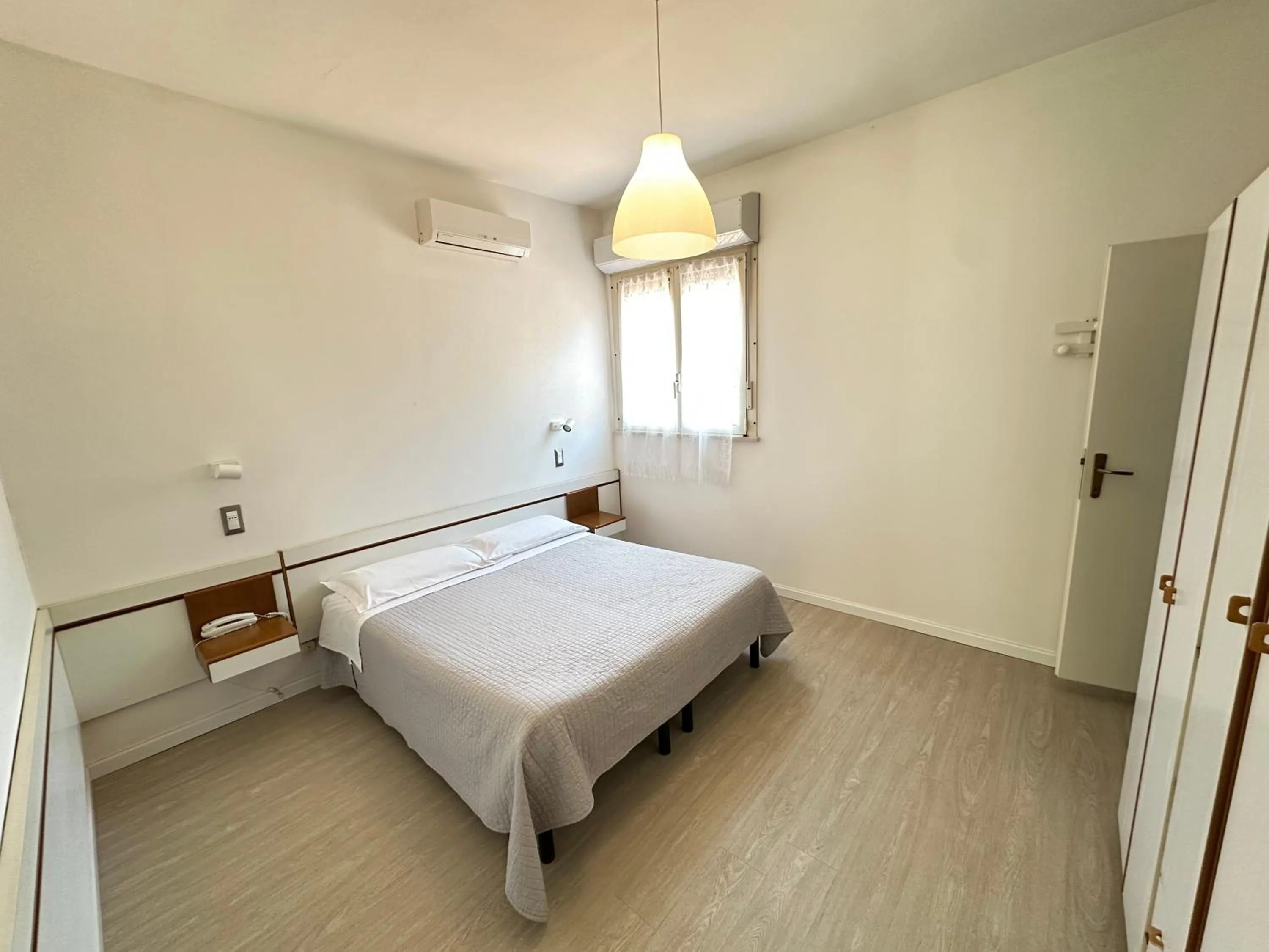 Bed in Hotel Fiorenza