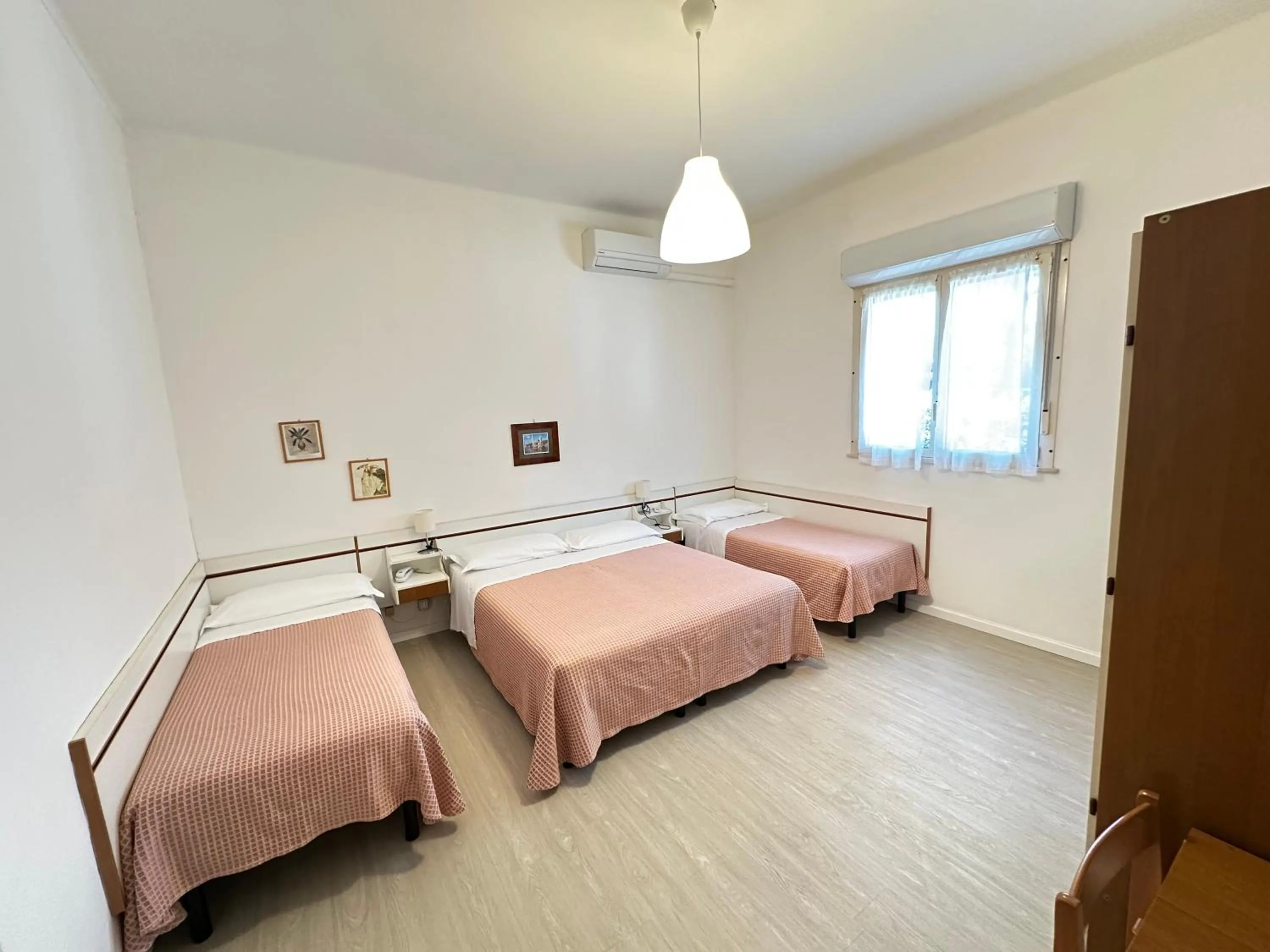 Bed in Hotel Fiorenza