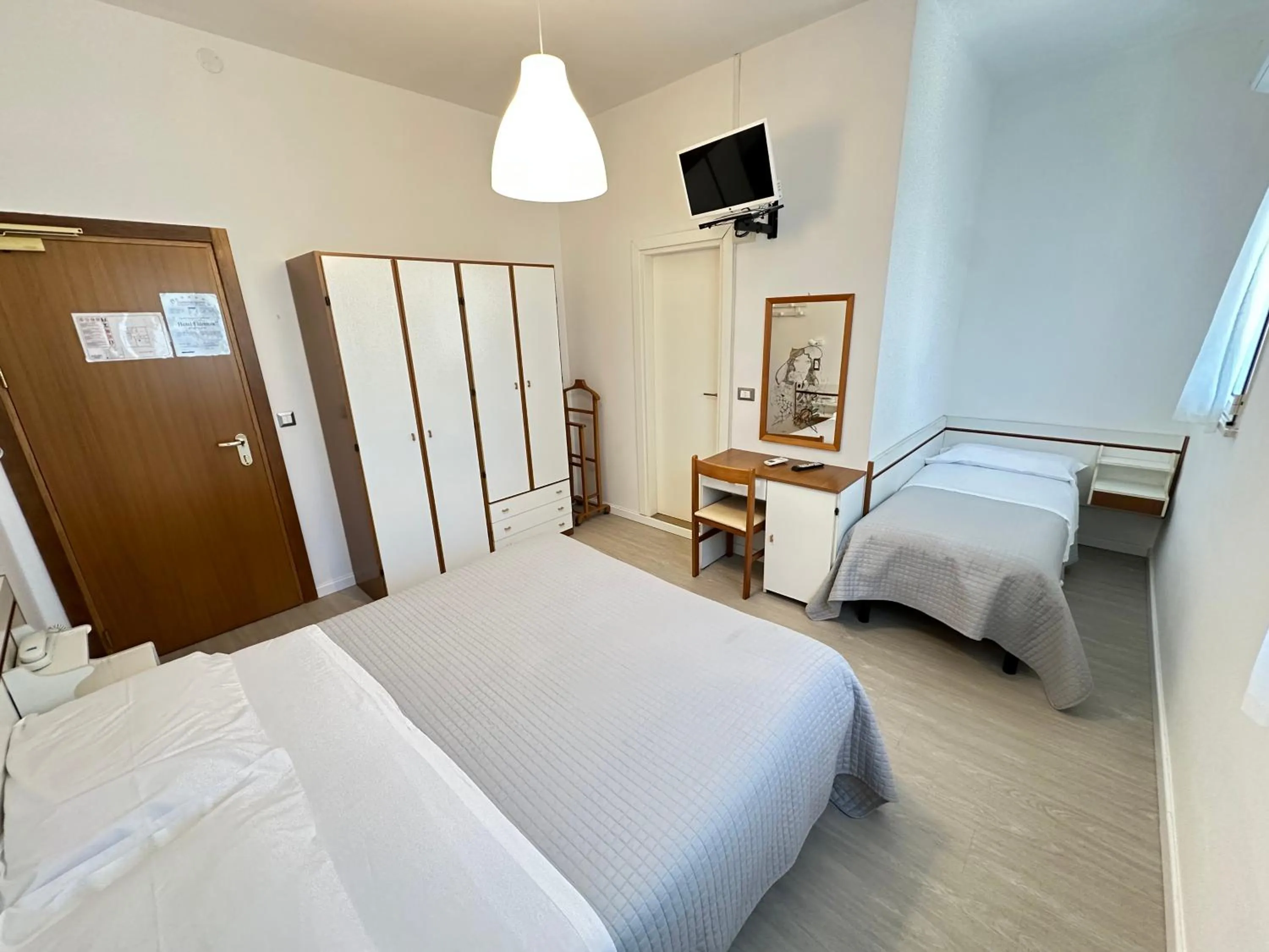 Bed in Hotel Fiorenza