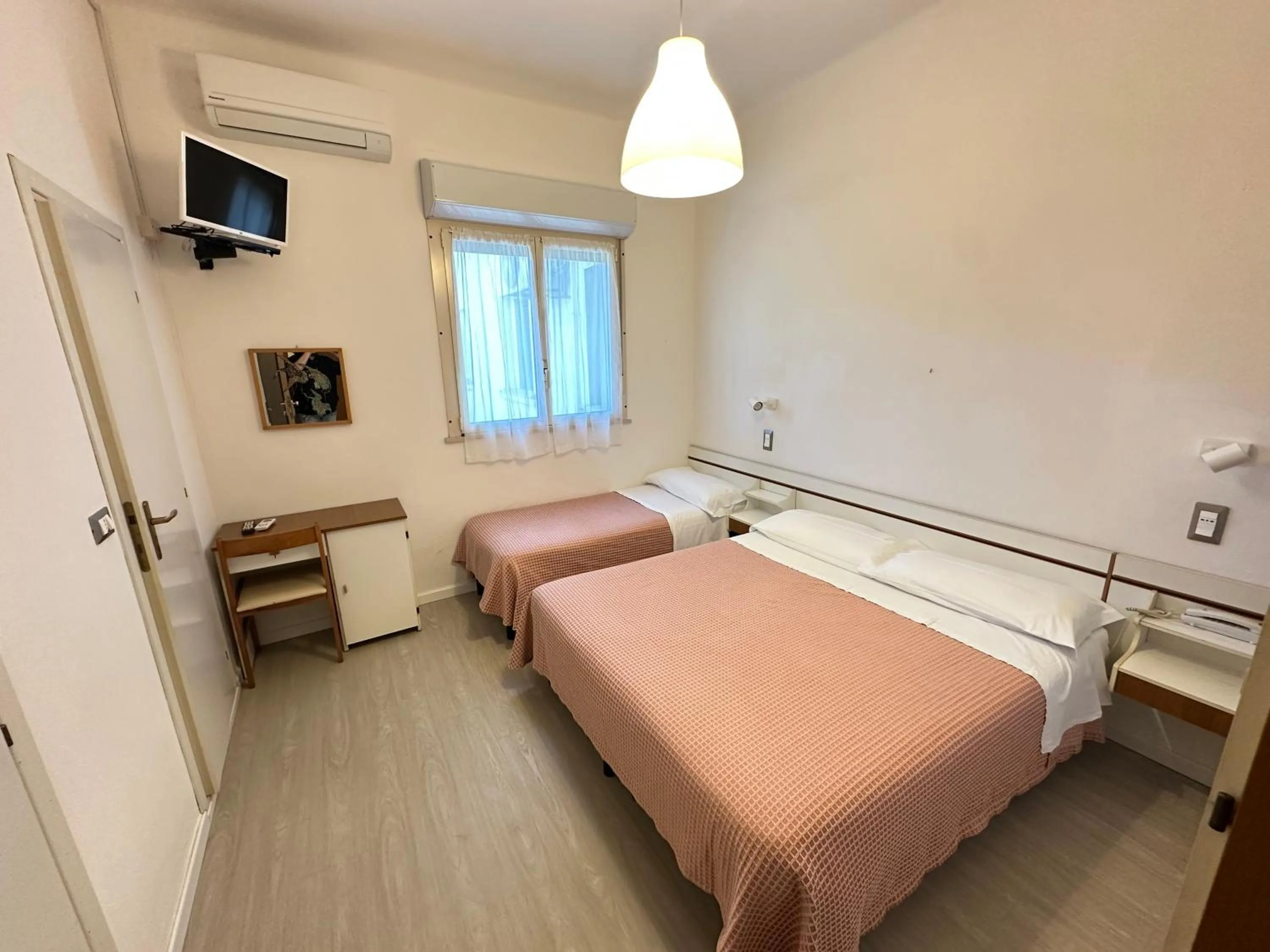 Bed in Hotel Fiorenza