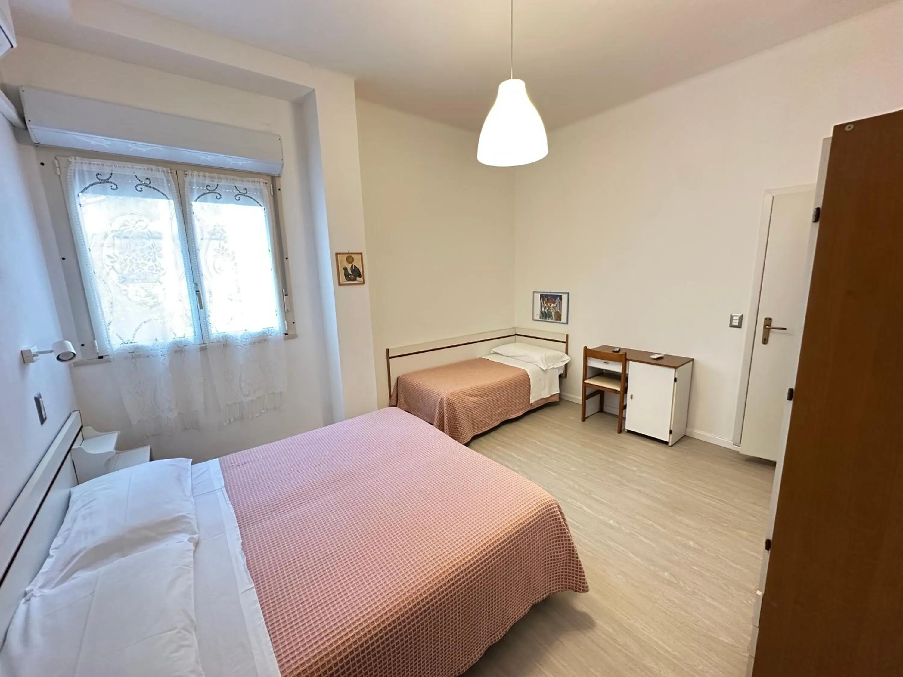 Bed in Hotel Fiorenza