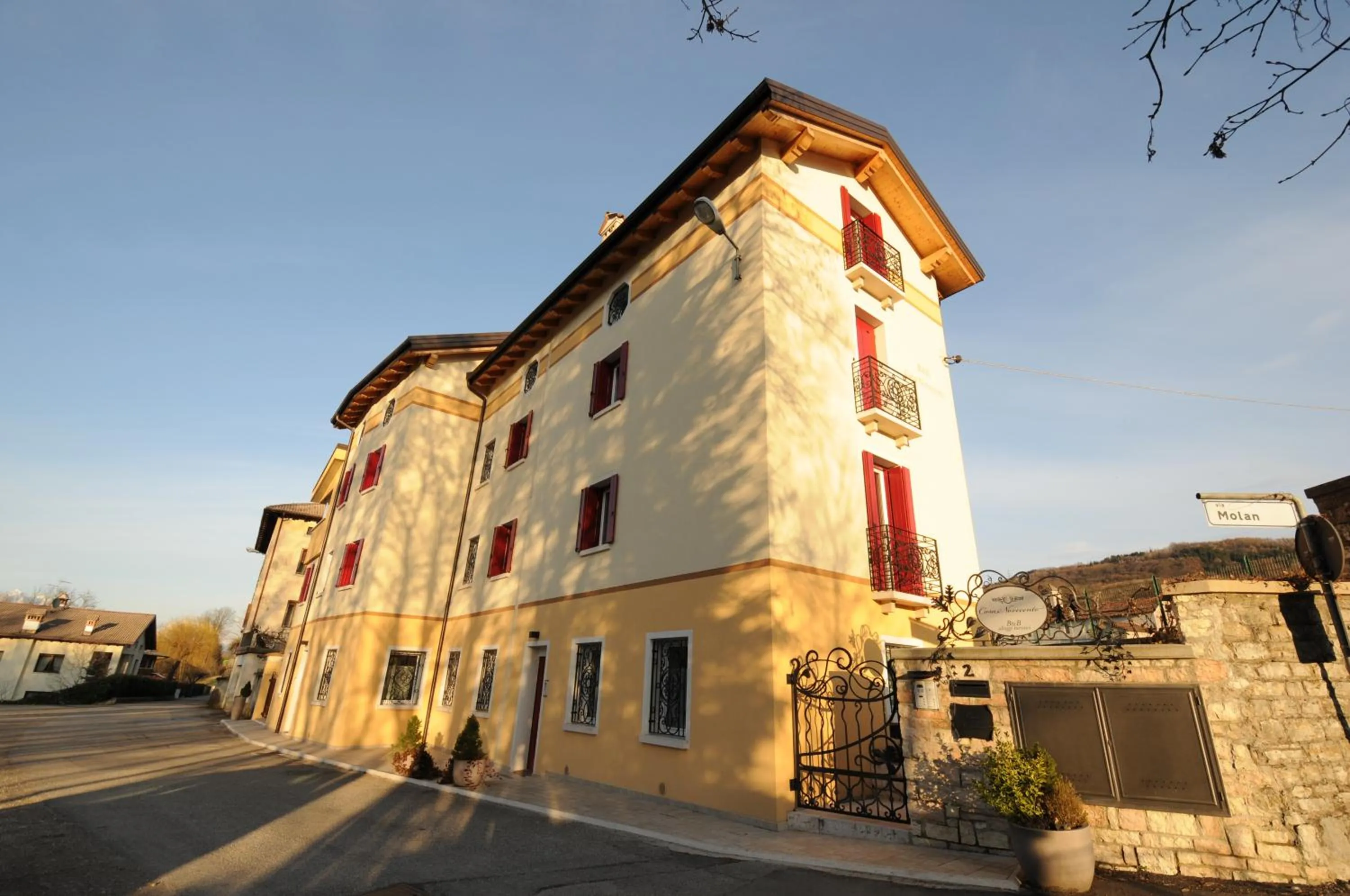 Property building in Casa Novecento "Rooms & apartments"