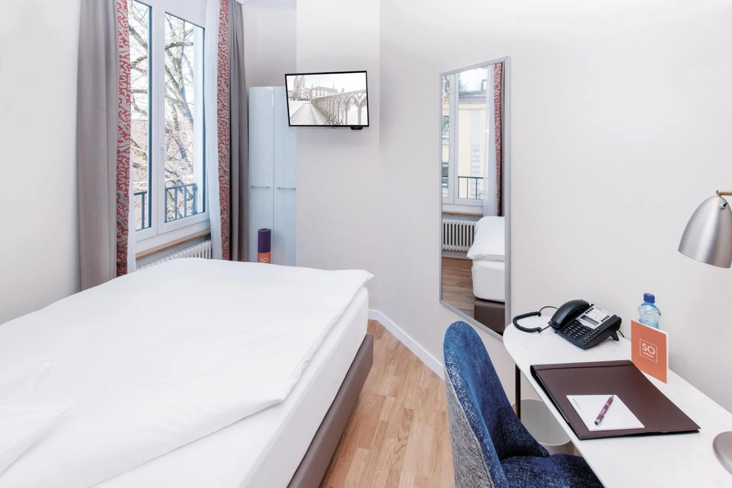 Photo of the whole room, Bed in Sorell Hotel Rex Zürich