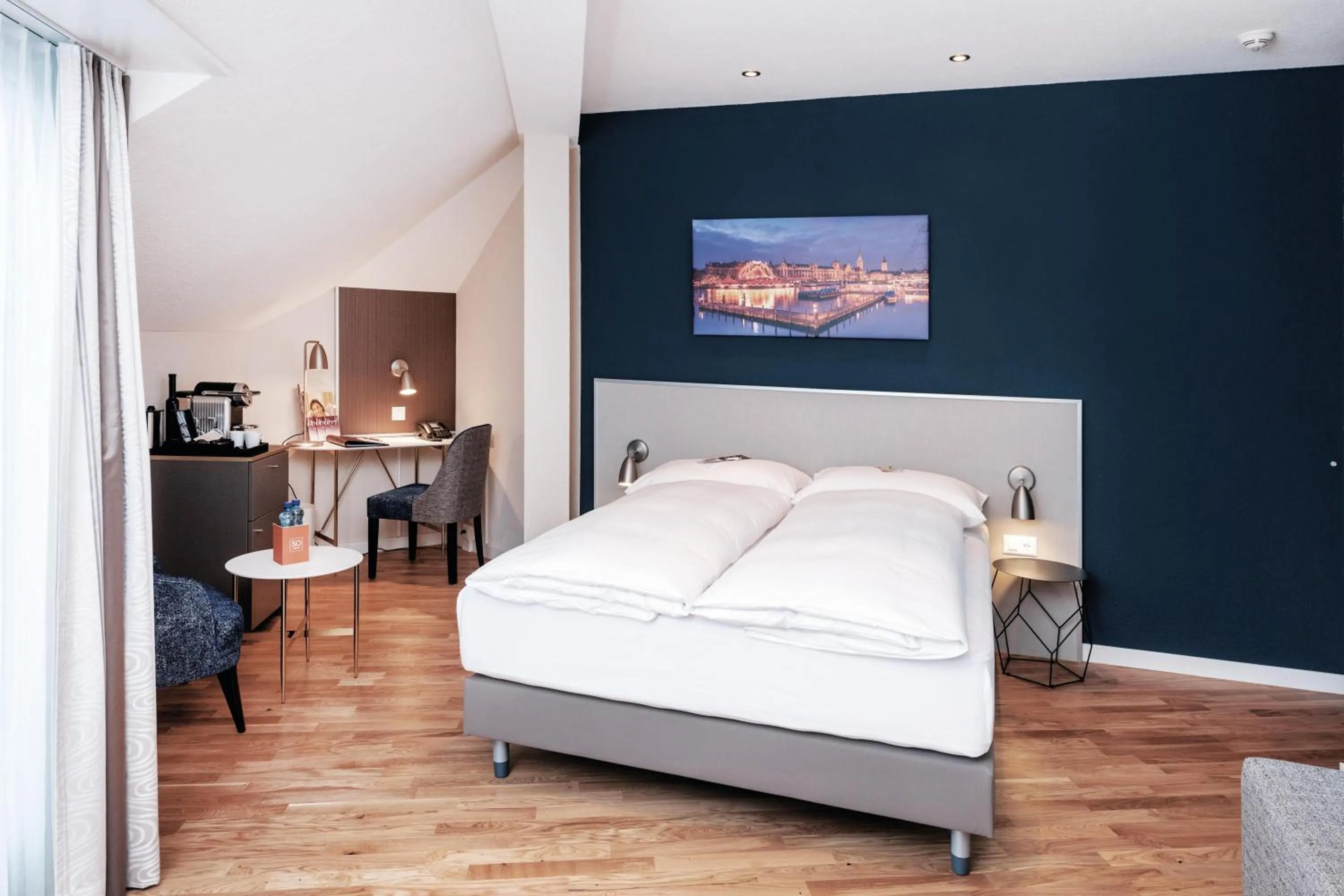 Bed in Sorell Hotel Rex Zürich