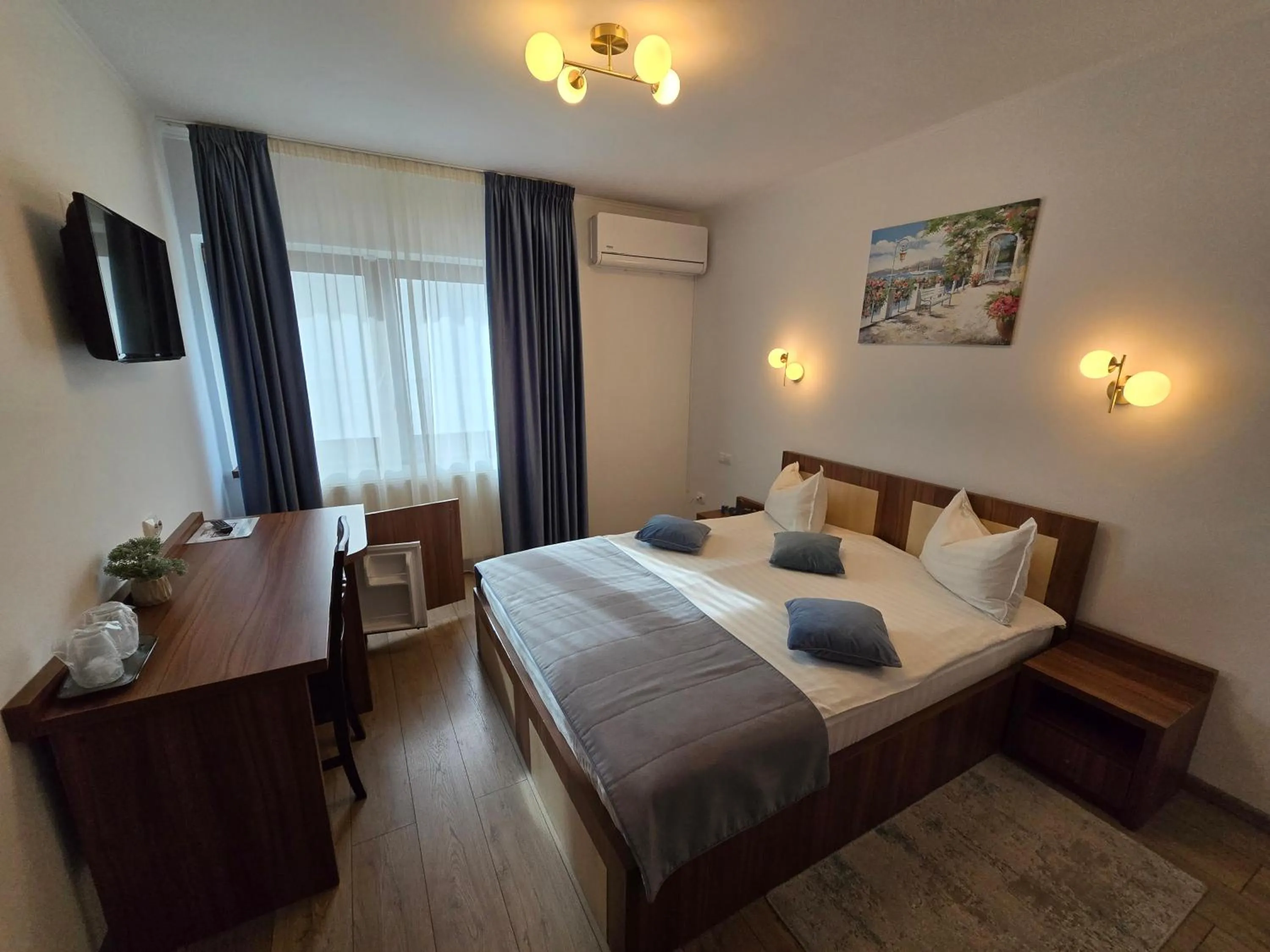 Bed in Pensiunea Transilvania