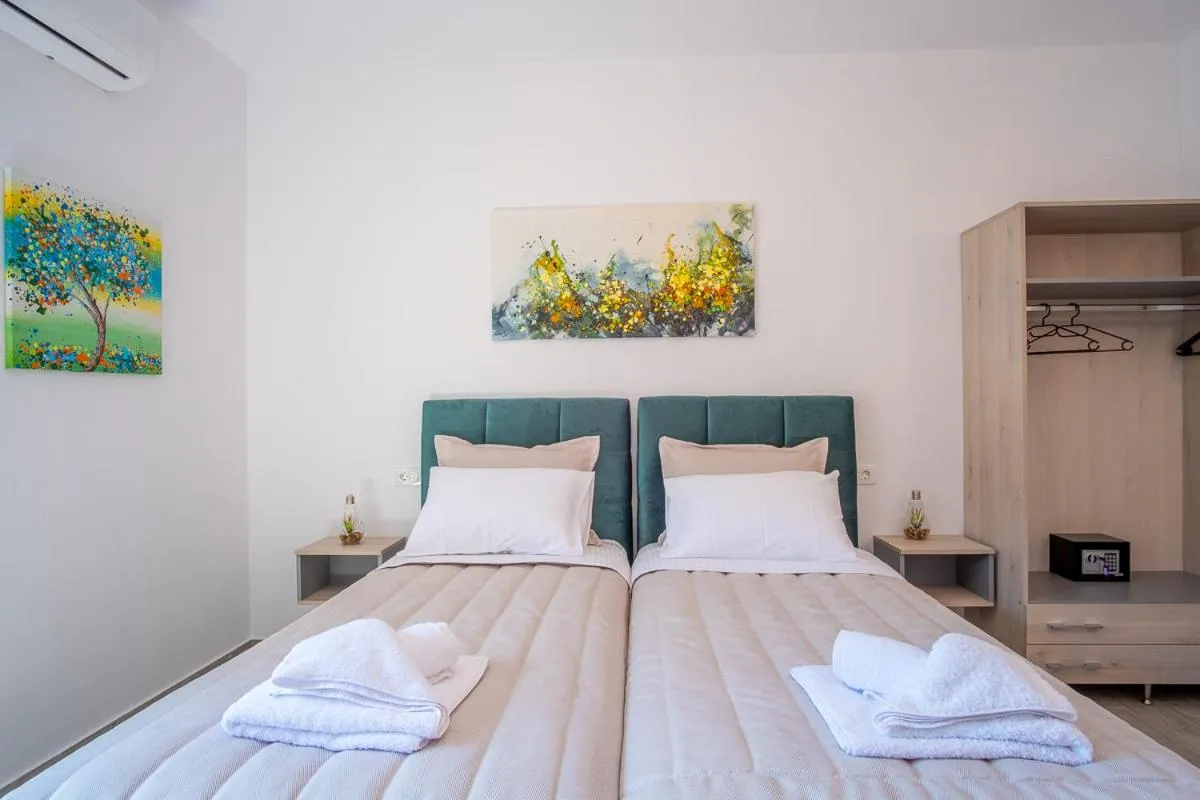 Bed in Serenity Luxe Suites