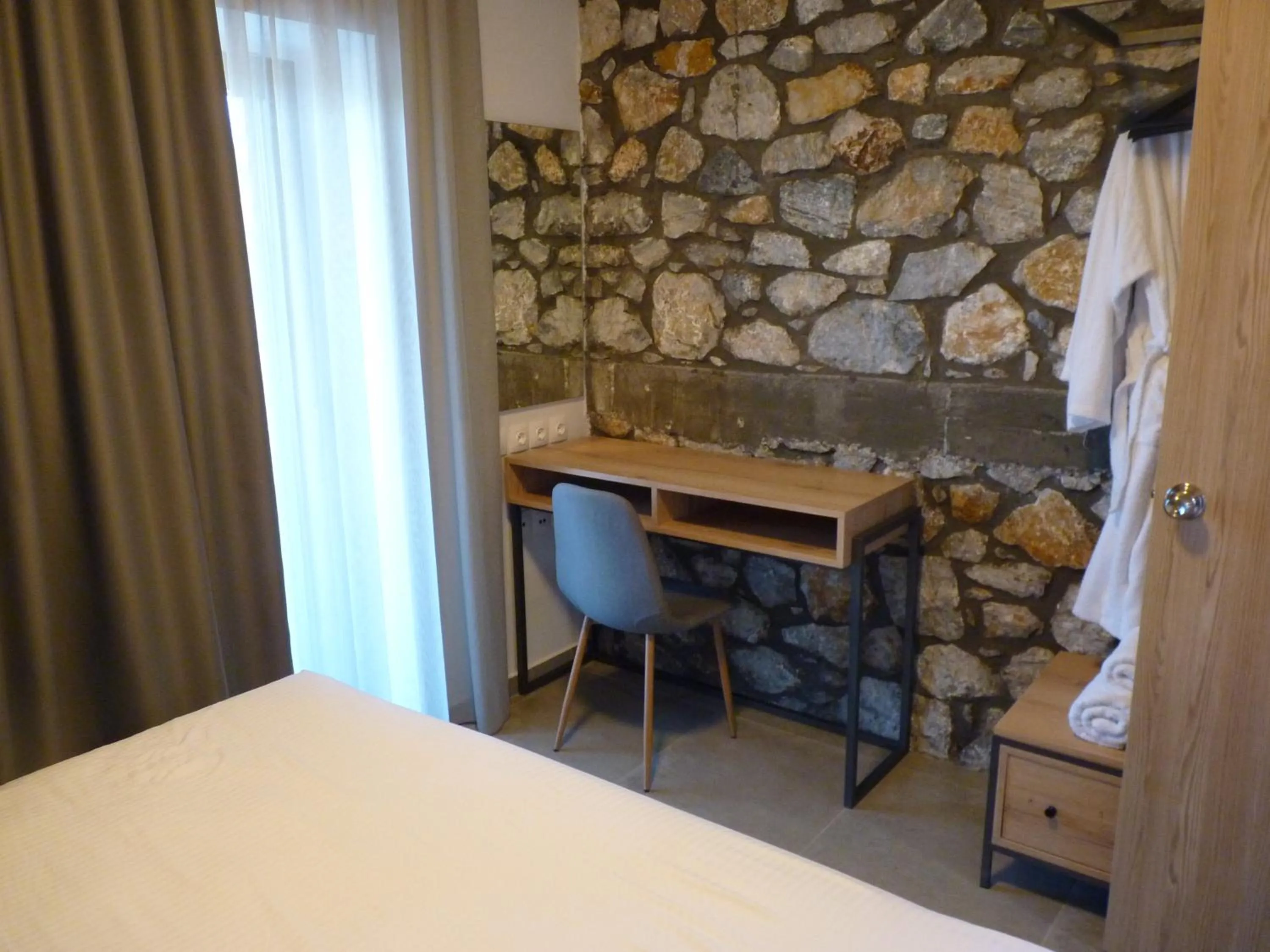 Bed in Comfort Suites & Rooms