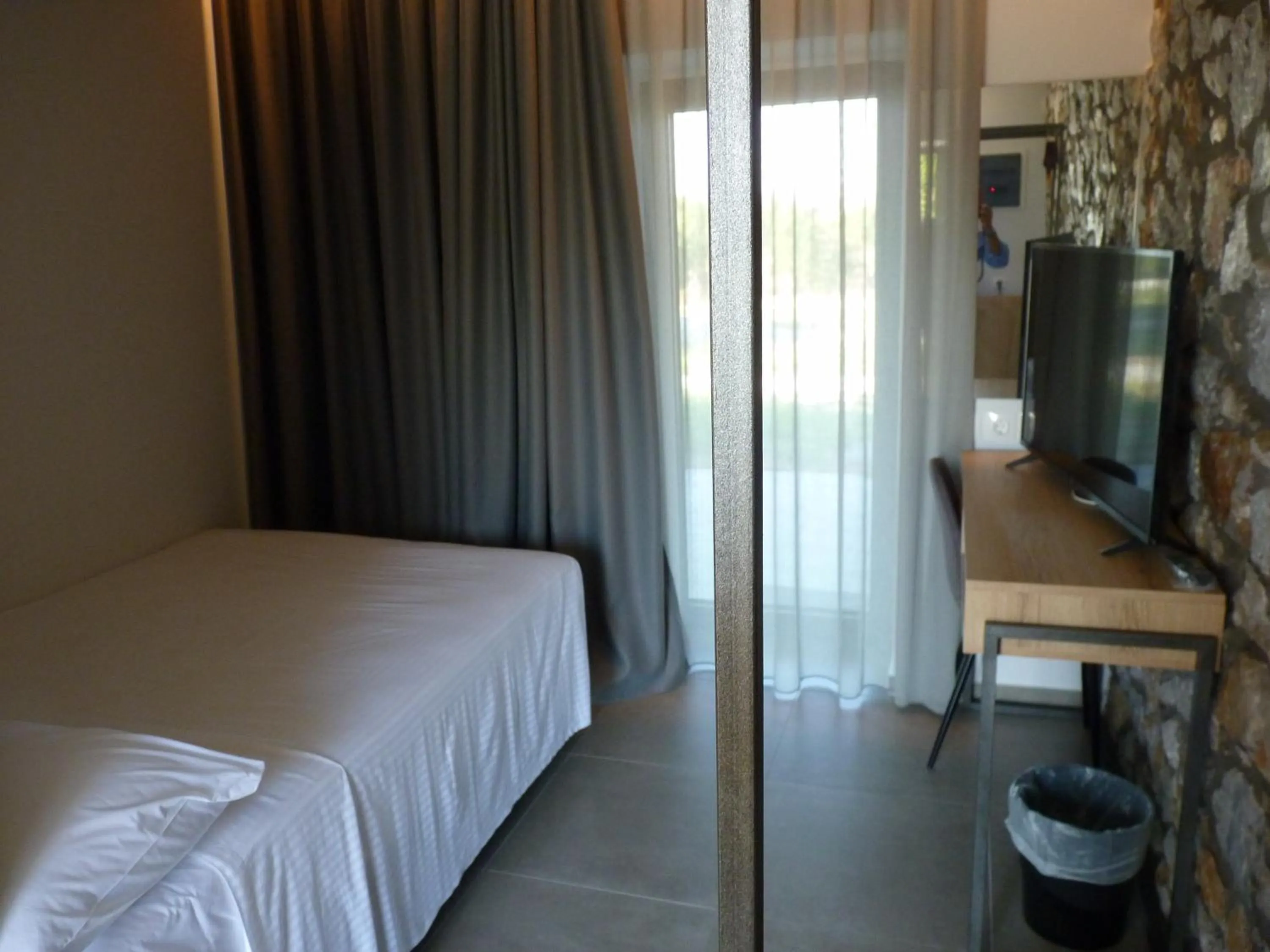 Bed in Comfort Suites & Rooms