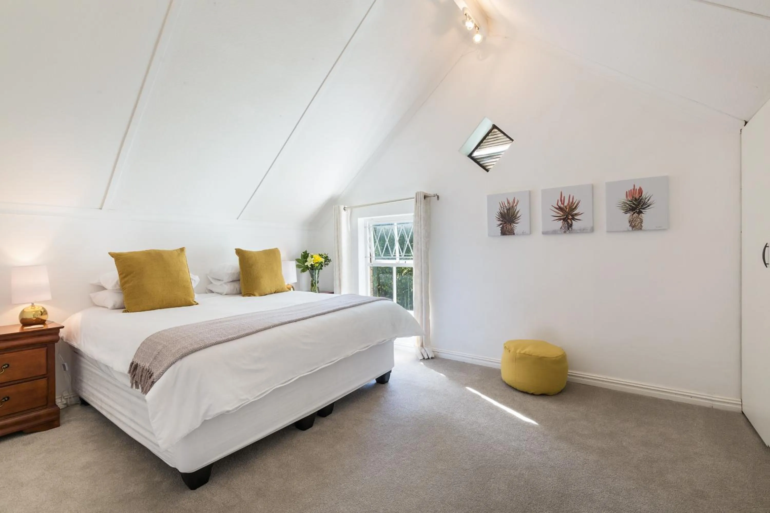 Bed in Rustic Manor Guest House