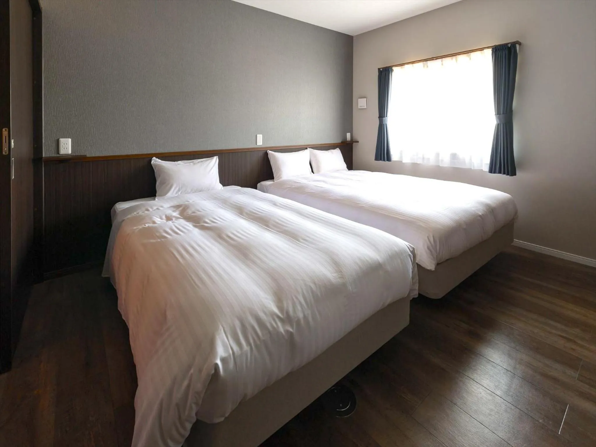 Bed in Ahman Inn Island Yagaji