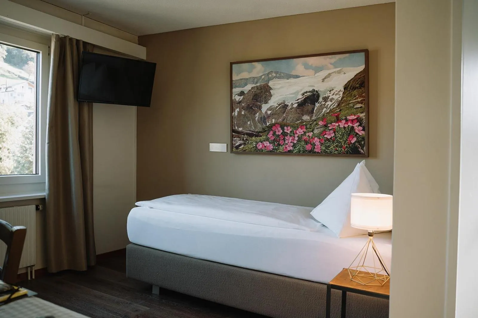 Bed in Alpenblick Weggis - Panorama & Alpen Chic Hotel