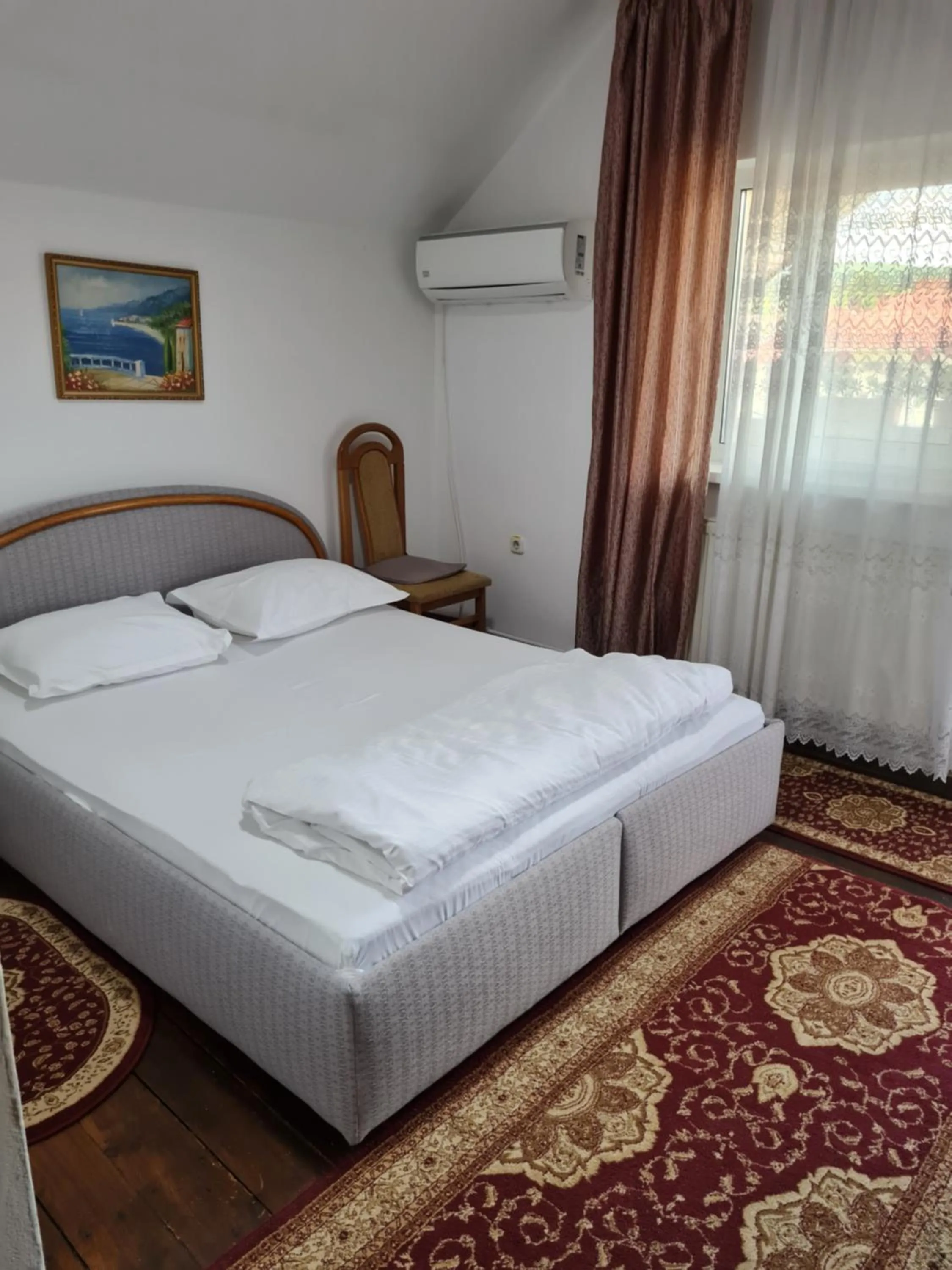 Photo of the whole room, Bed in Pensiunea Clasic