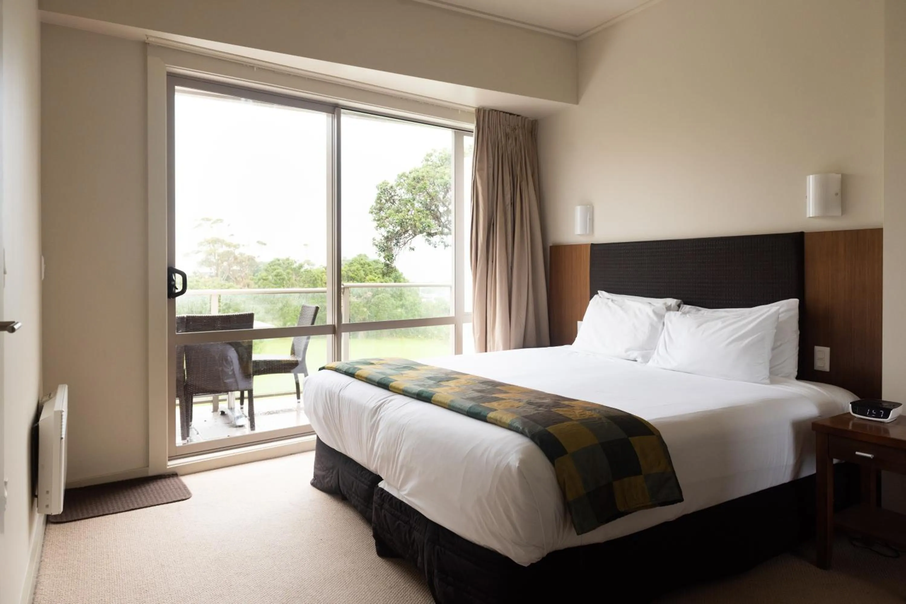 Bed in Ocean Breeze Hotel