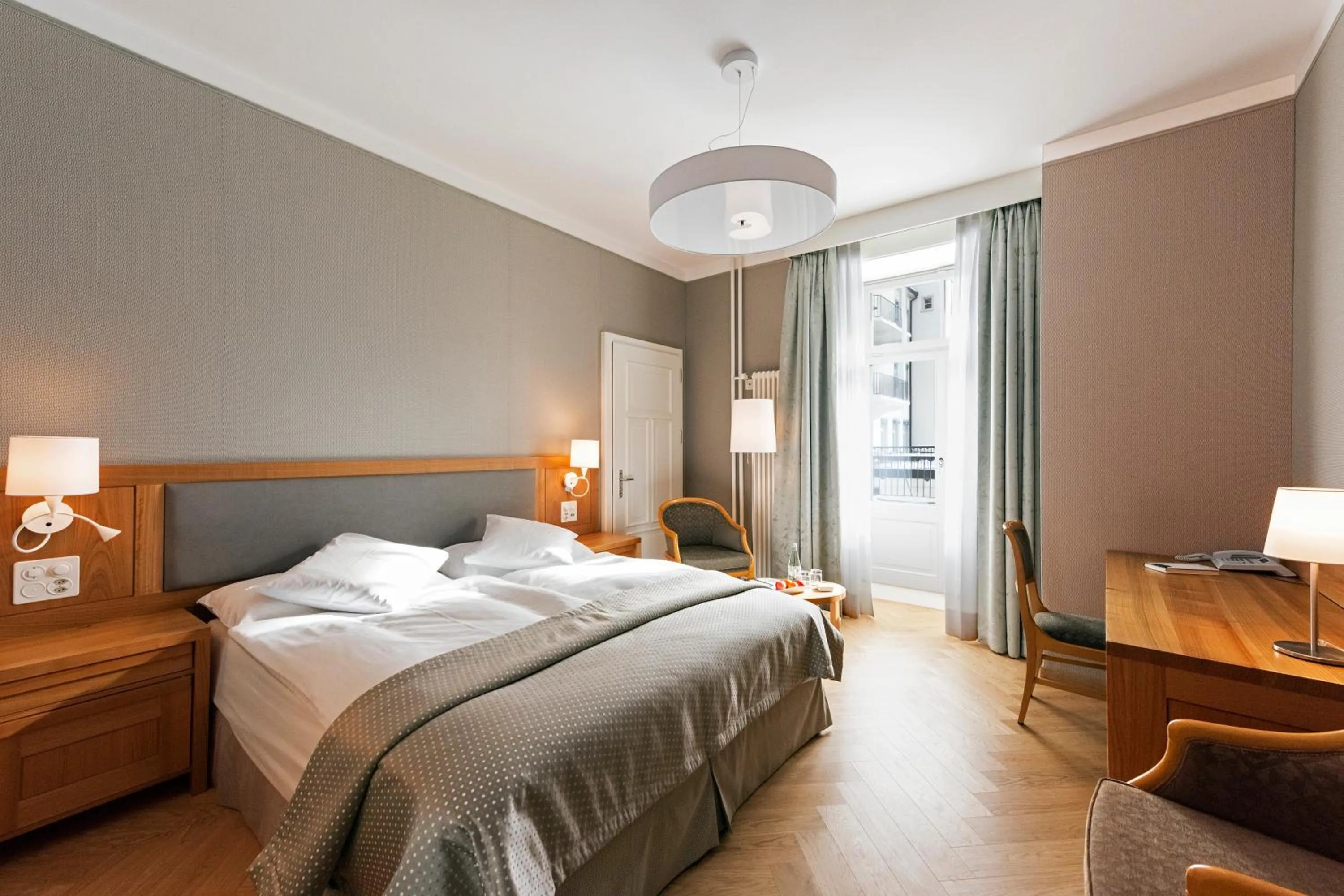 Photo of the whole room, Bed in Hotel Waldhaus Sils