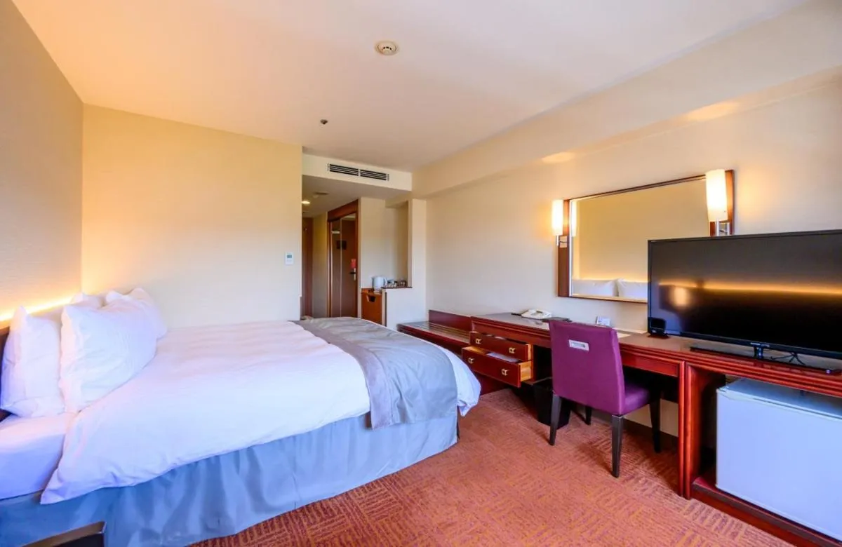 Bed in Fukuyama New Castle Hotel