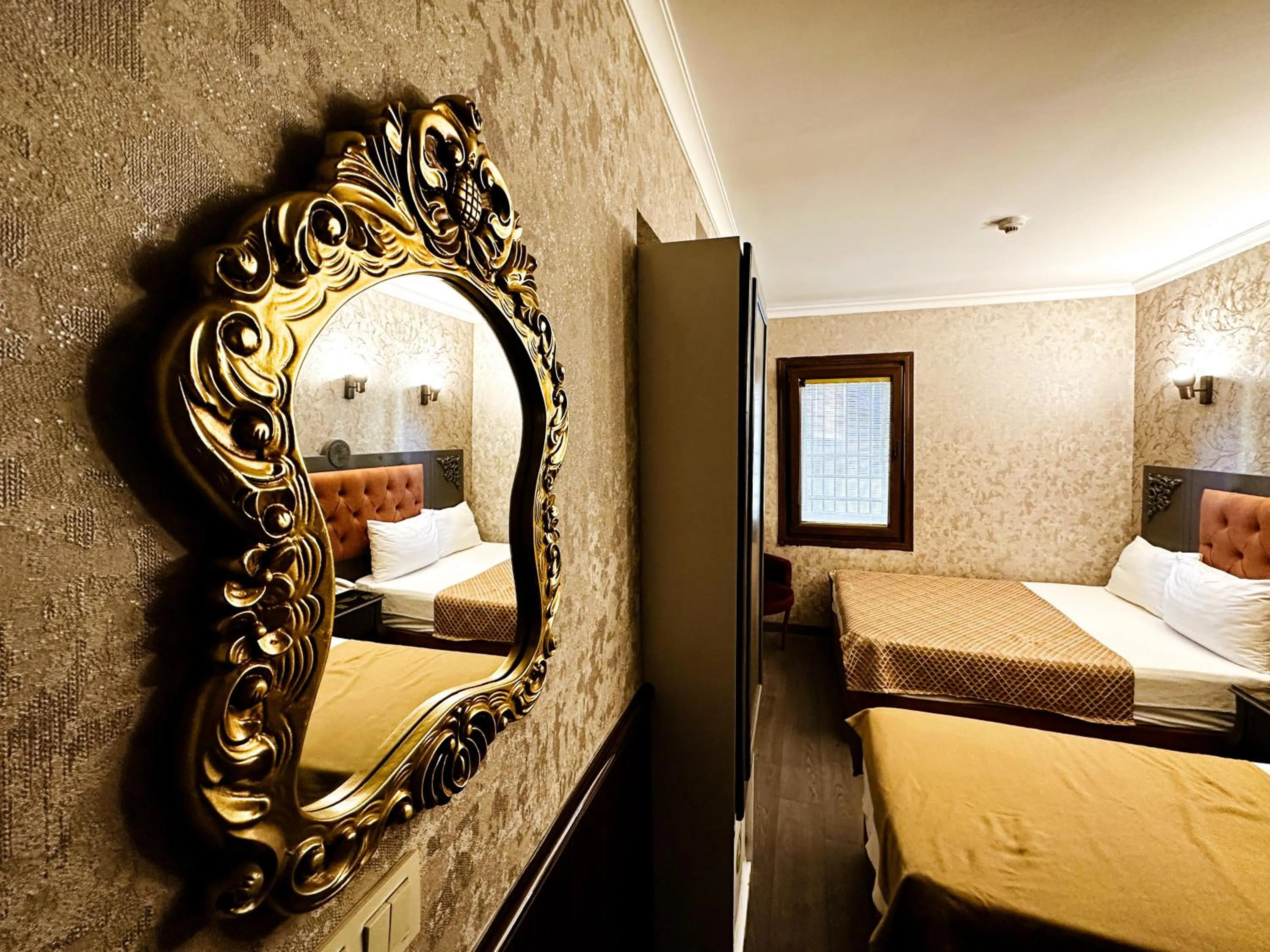 Bed in Taksim Cuento Hotel