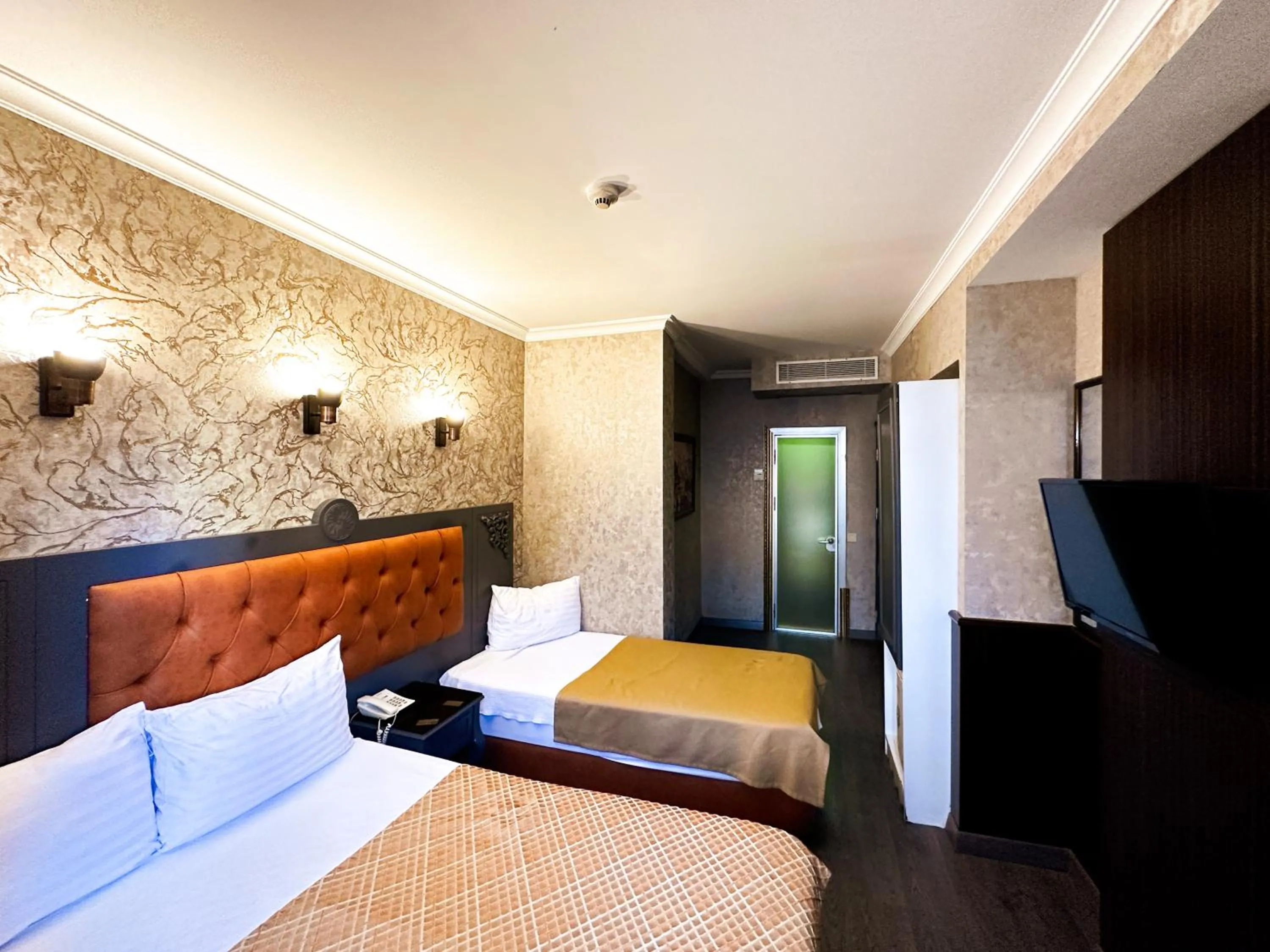 Bed in Taksim Cuento Hotel