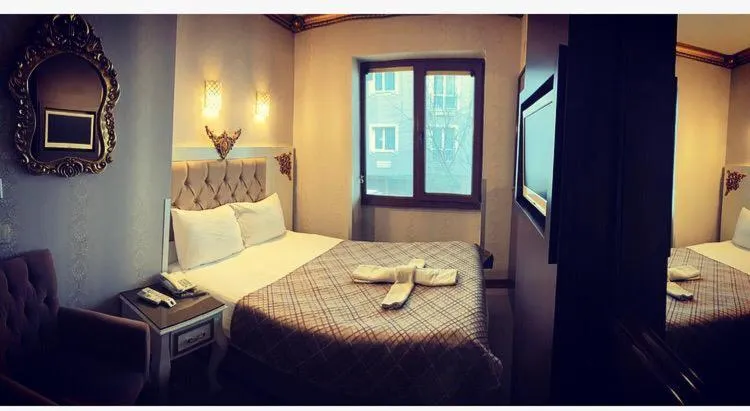 Bed in Taksim Cuento Hotel