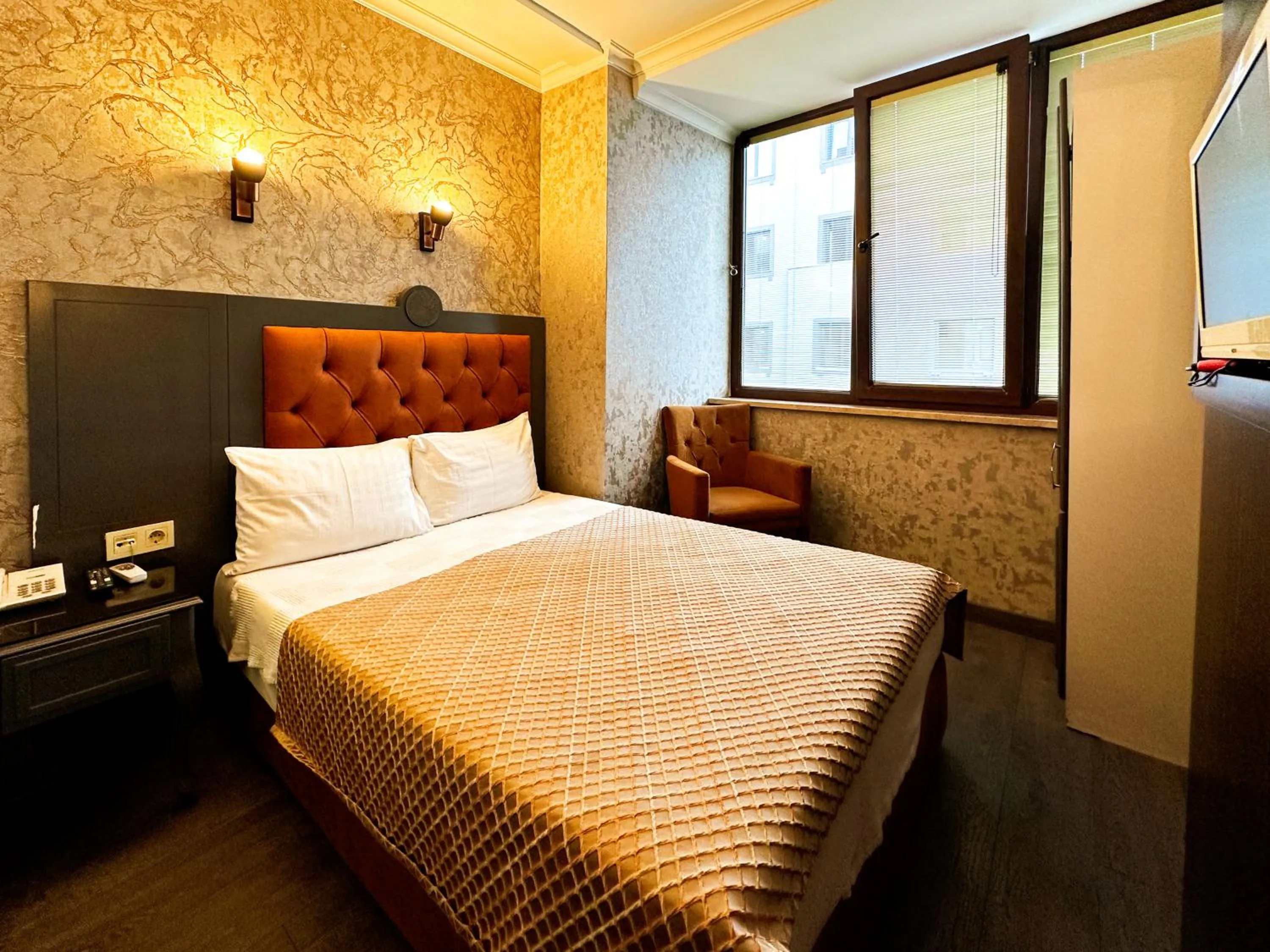 Bed in Taksim Cuento Hotel