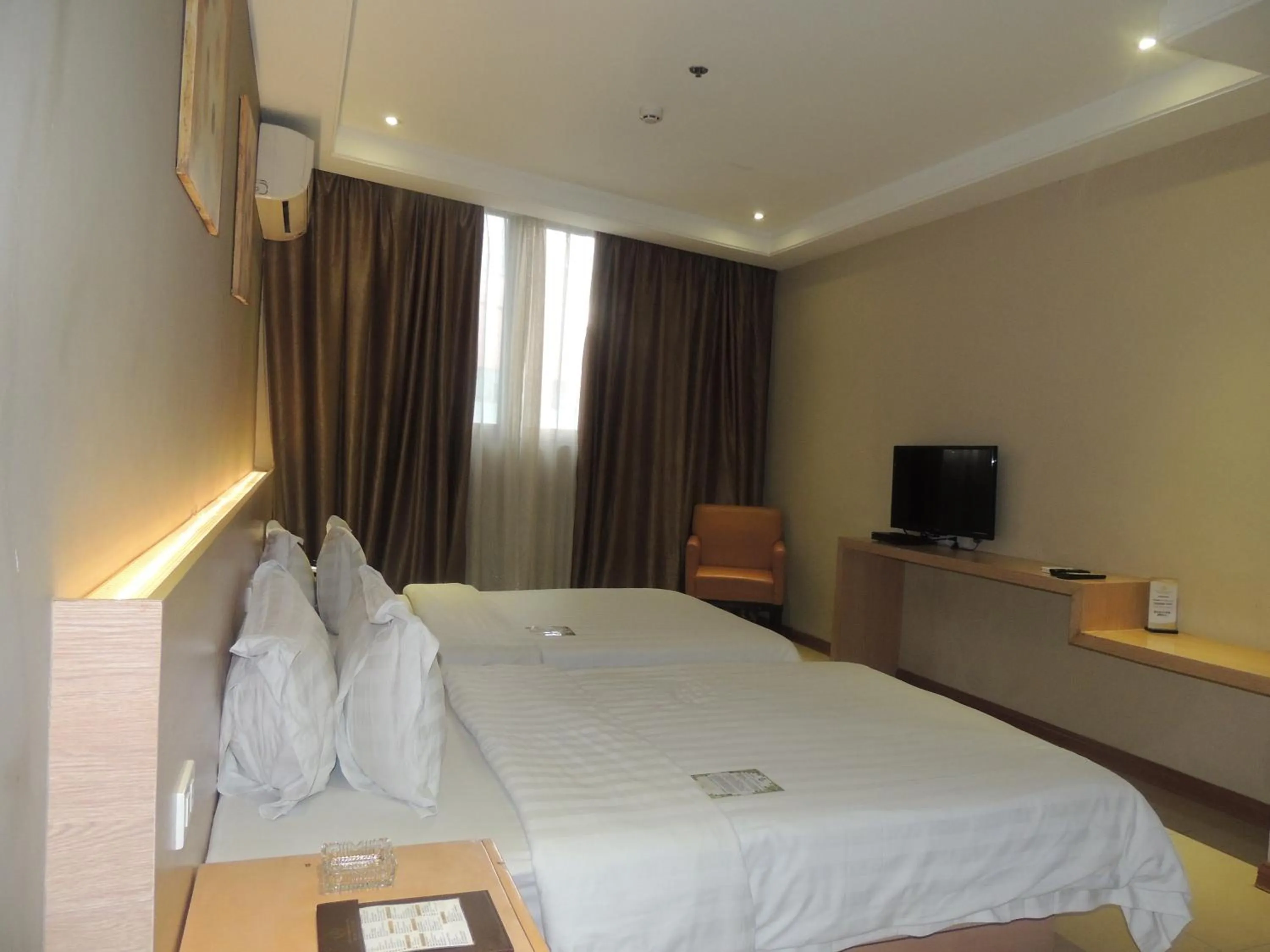 Bed in Dela Chambre Hotel