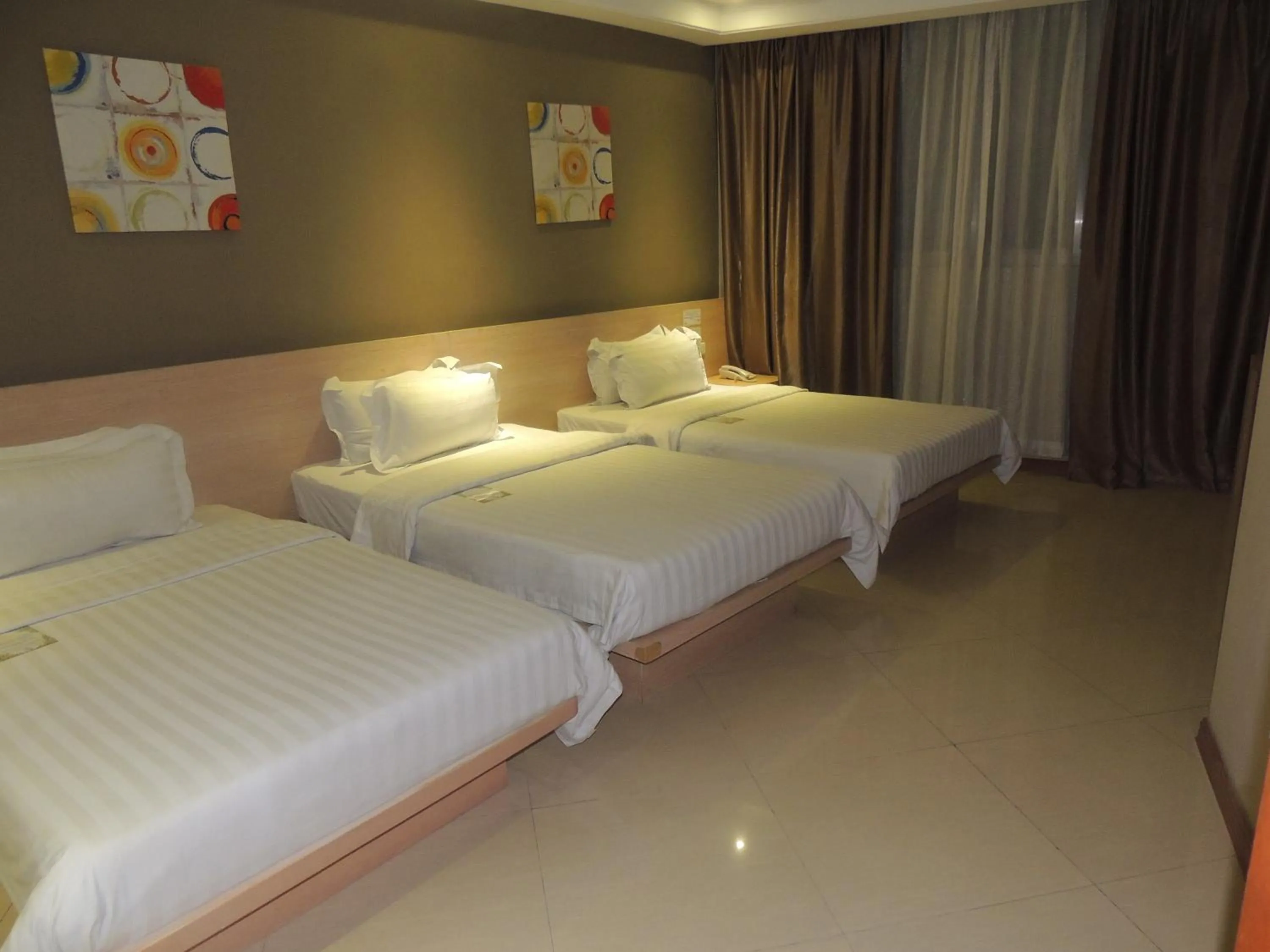 Bed in Dela Chambre Hotel