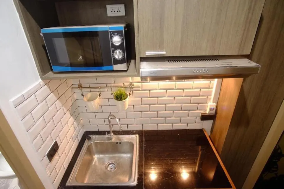 Kitchen or kitchenette in Krung Boutique Hotel