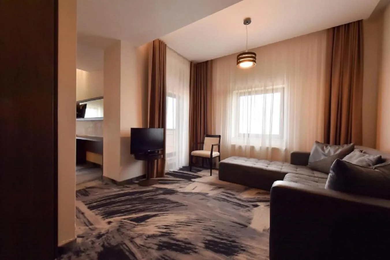 Living room, Bed in Hotel Scapino