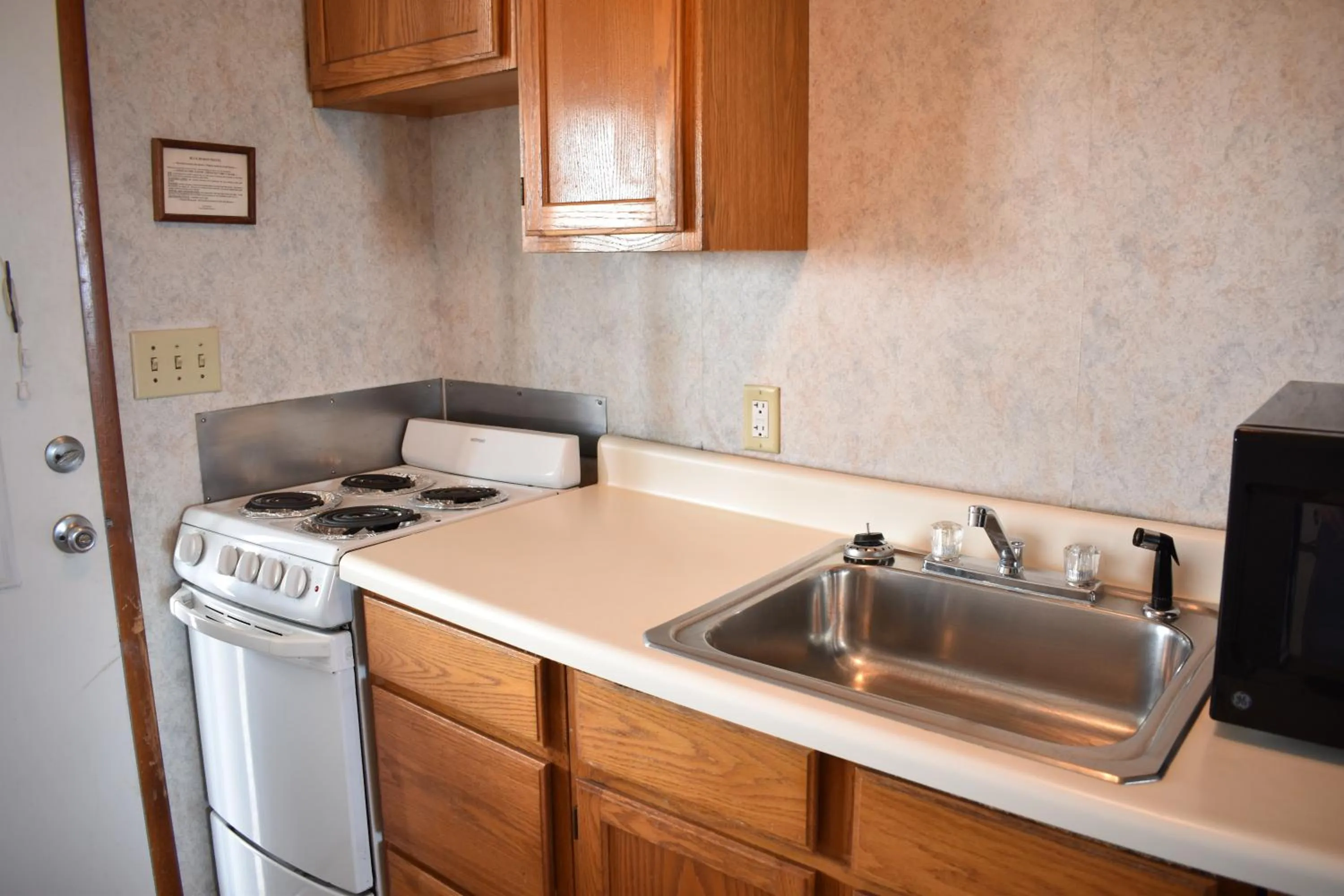 Kitchen or kitchenette in Blue Heron Motel